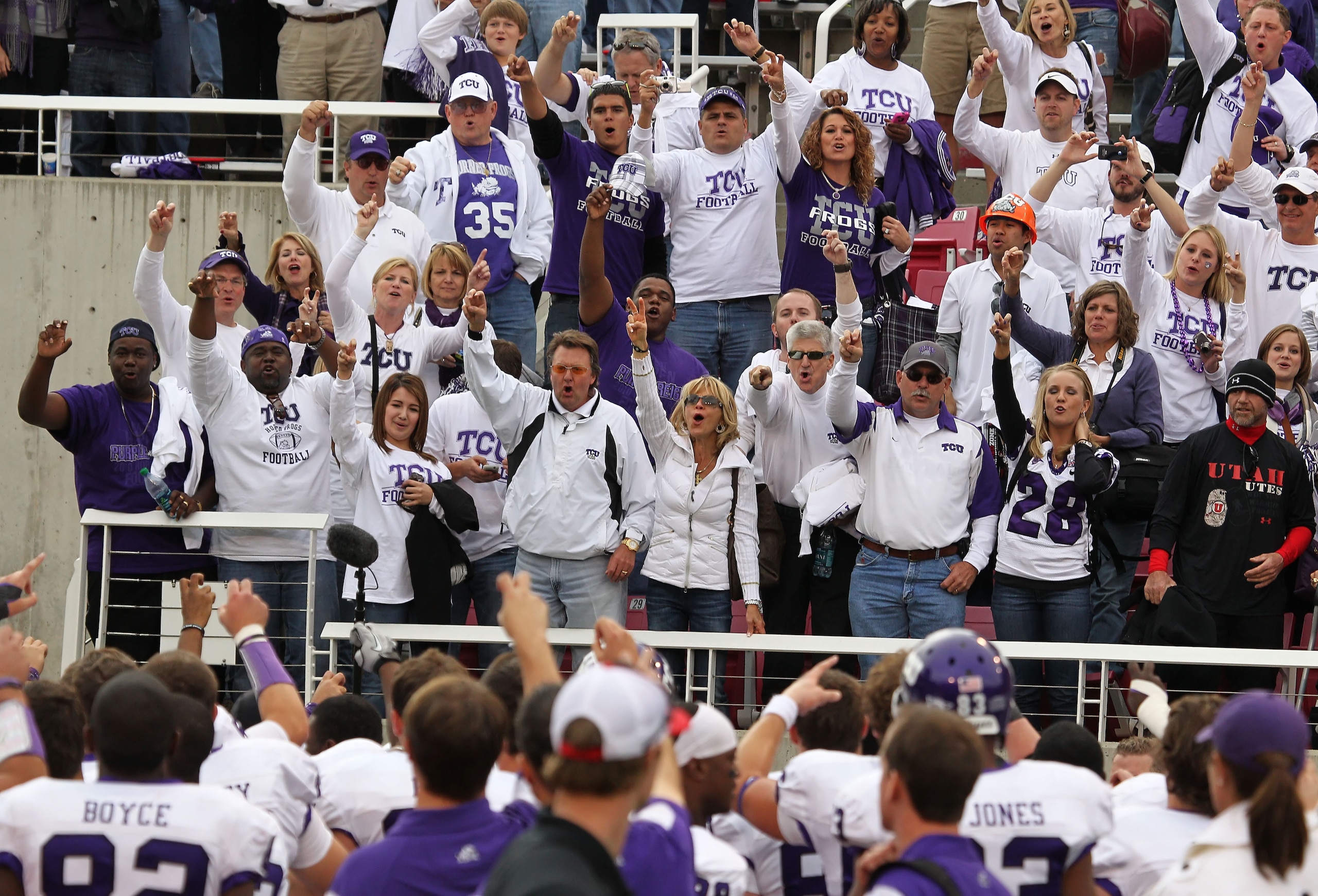 SALT LAKE CITY, UT - NOVEMBER 6: Fans of the TCU Horned Frogs cheer their team after a game against the Utah Utes during the second half of an NCAA Football game November 6, 2010 at Rice-Eccles Stadium in Salt Lake City, Utah. TCU Beat Utah 47-7.  (Photo