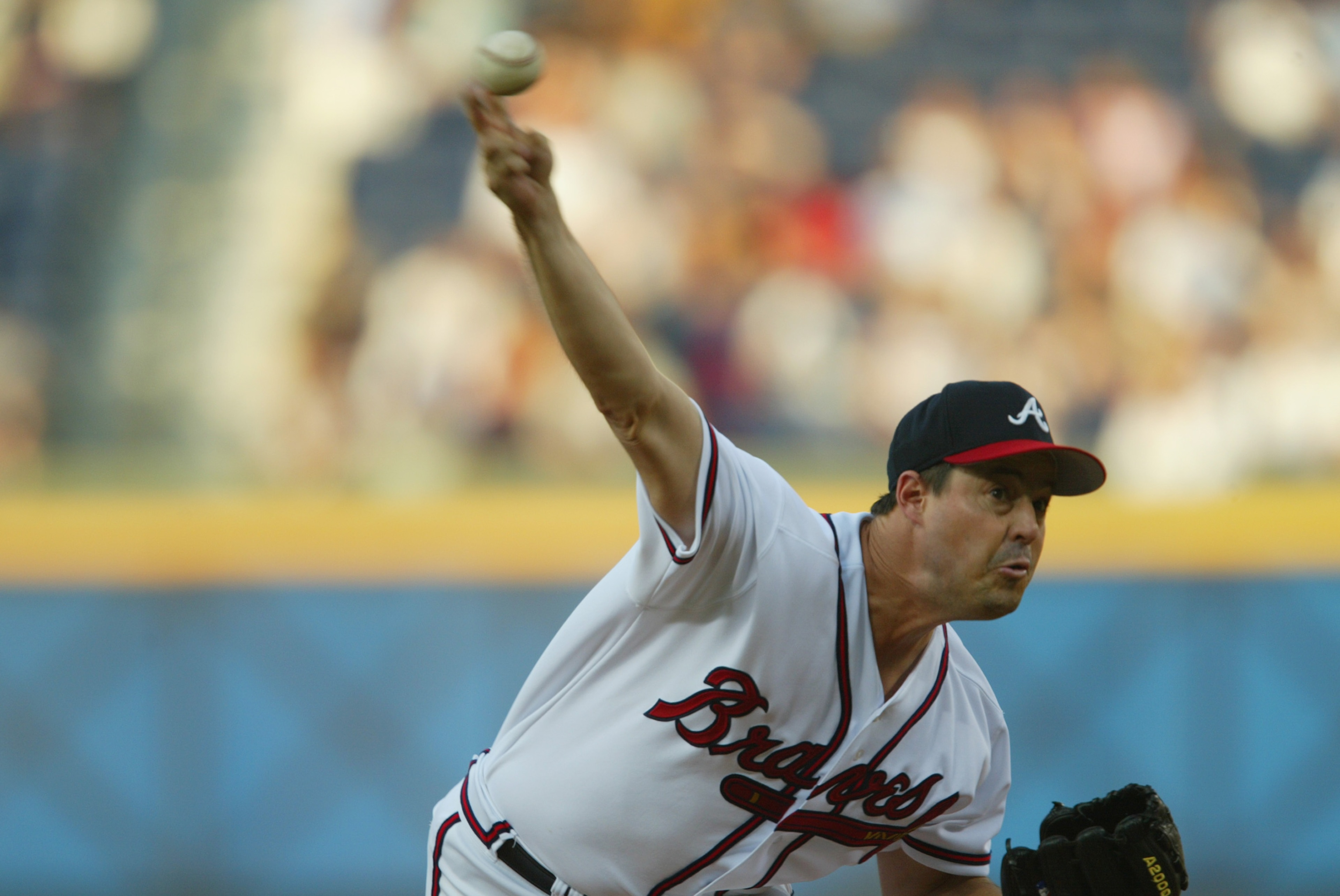 ATLANTA - JULY 17:  Starting Pitcher Greg Maddux #31 of the Atlanta Braves throws the ball against the Florida Marlins  during the game on July 17, 2002 at Turner Field in Atlanta, Georgia.  The Braves shutout the Marlins 10-0.  (Photo by Jamie Squire/Get
