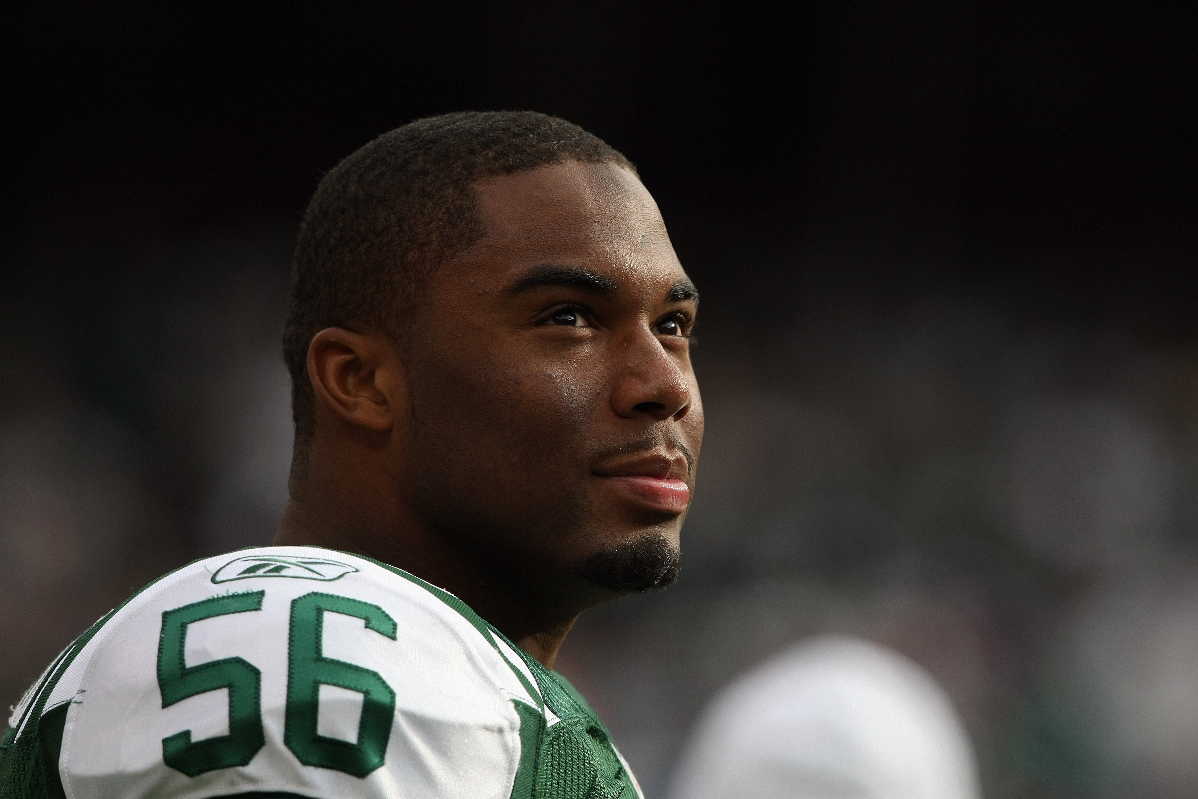 EAST RUTHERFORD, NJ - NOVEMBER 09: Vernon Gholston #56 of the New York Jets on the sideline against the St. Louis Rams at Giants Stadium on November 9, 2008 in East Rutherford, New Jersey. (Photo by Nick Laham/Getty Images)