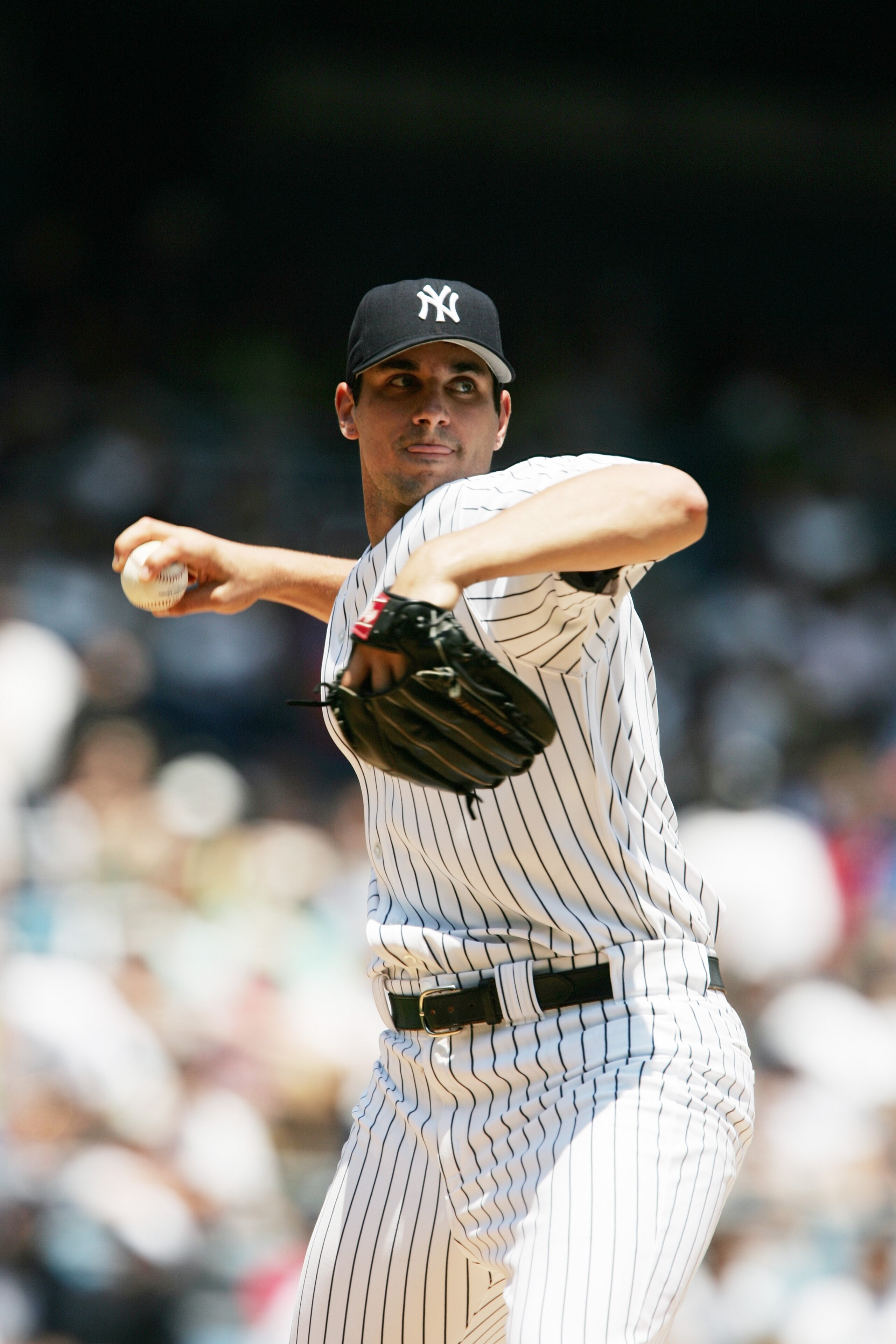 NEW YORK - JUNE 22:  Carl Pavano #45 of the New York Yankees pitches against the Tampa Bay Devil Rays on June 22, 2005 at Yankee Stadium in the Bronx, New York.  The Devil Rays won 5-3.  (Photo by Al Bello/Getty Images)