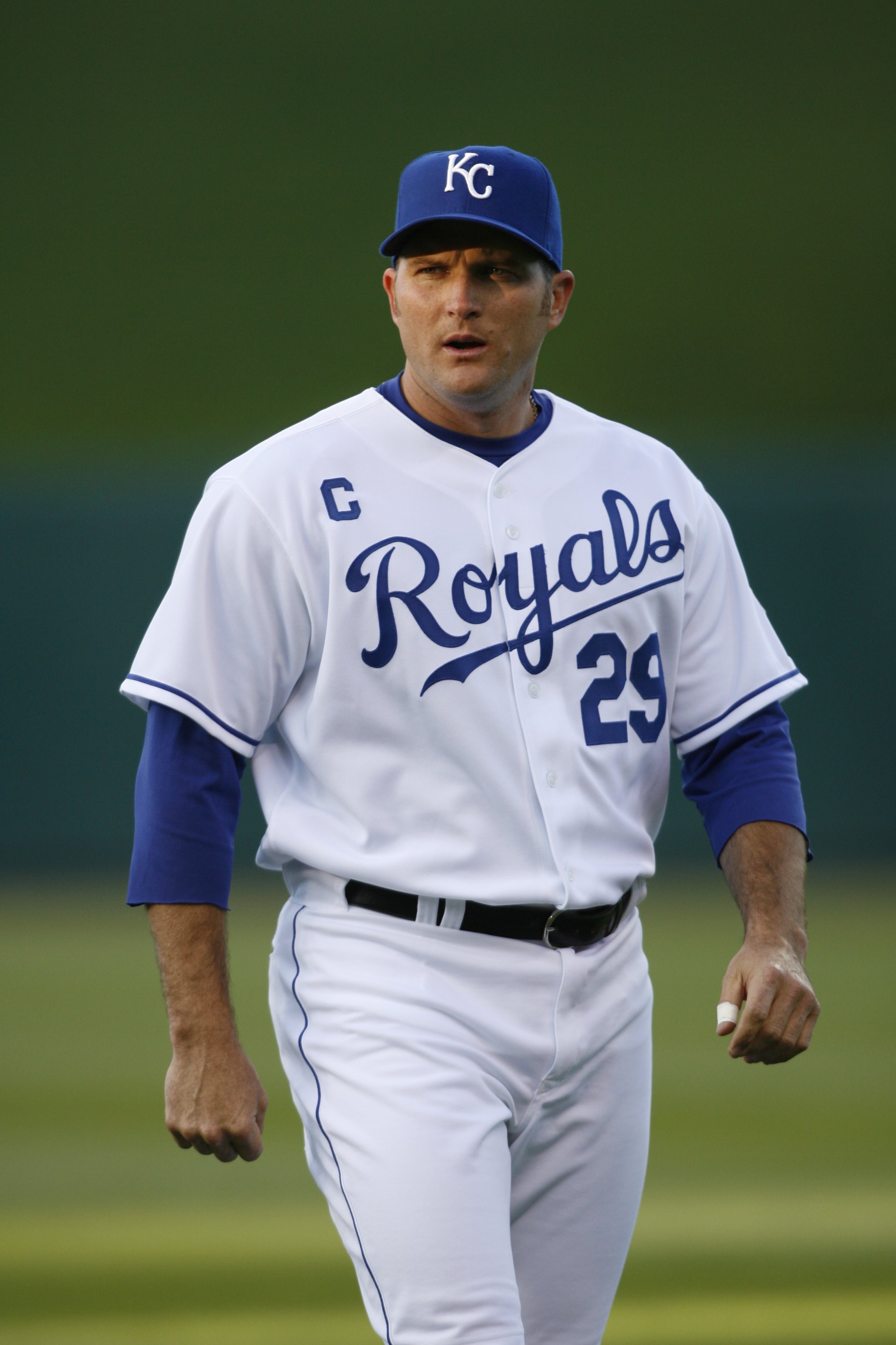KANSAS CITY, MO - APRIL 4:  Mike Sweeney #29 of the Kansas City Royals walks on the field during the game against the Boston Red Sox on April 4, 2007 at Kauffman Stadium in Kansas City, Missouri.  Boston won 7-1. (Photo by G. Newman Lowrance/Getty Images)