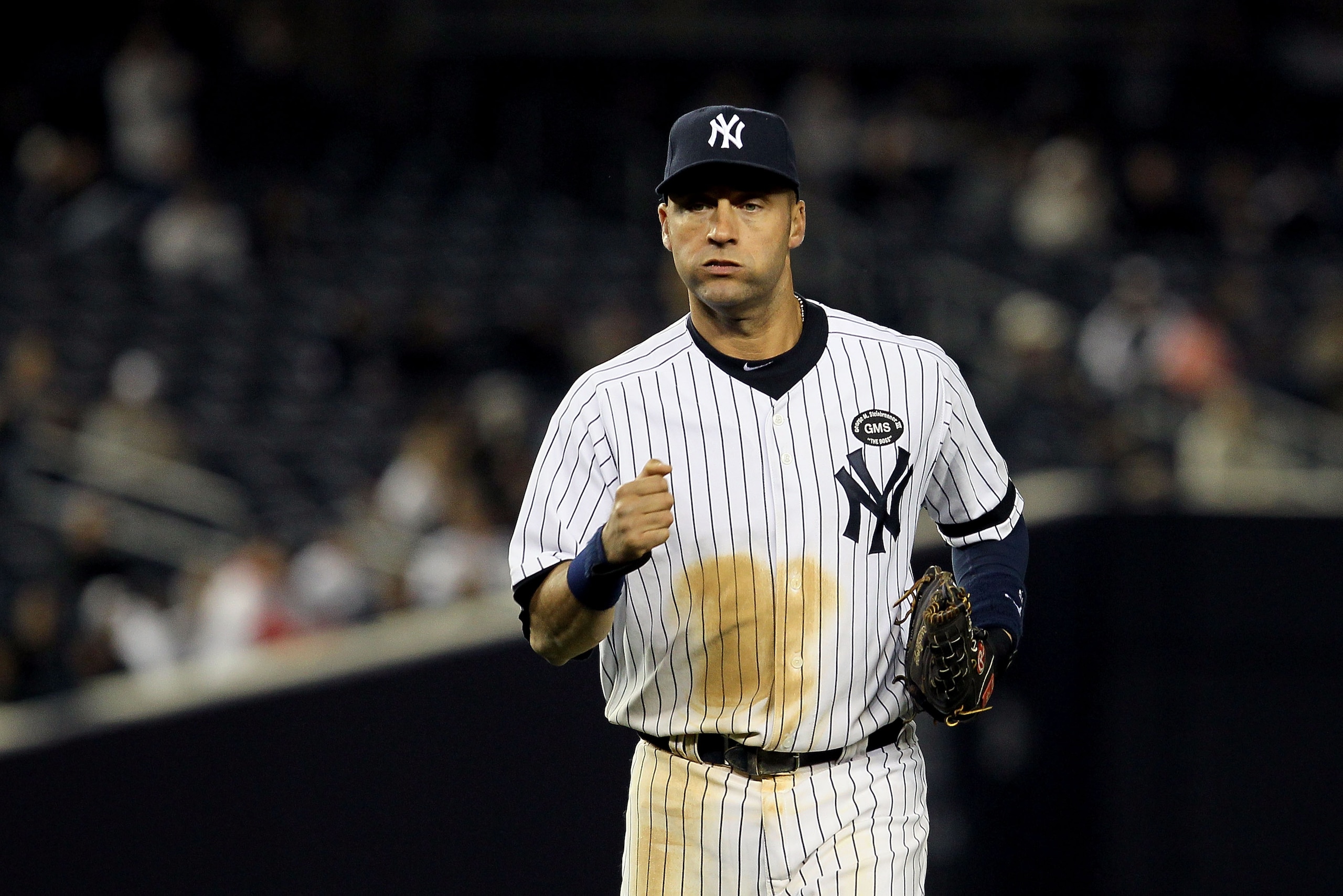 NEW YORK - OCTOBER 19: Derek Jeter #2 of the New York Yankees runs back to the dugout against the Texas Rangers in Game Four of the ALCS during the 2010 MLB Playoffs at Yankee Stadium on October 19, 2010 in the Bronx borough of New York City. The Rangers NEW YORK - OCTOBER 19: Derek Jeter #2 of the New York Yankees runs back to the dugout against the Texas Rangers in Game Four of the ALCS during the 2010 MLB Playoffs at Yankee Stadium on October 19, 2010 in the Bronx borough of New York City. The Rangers