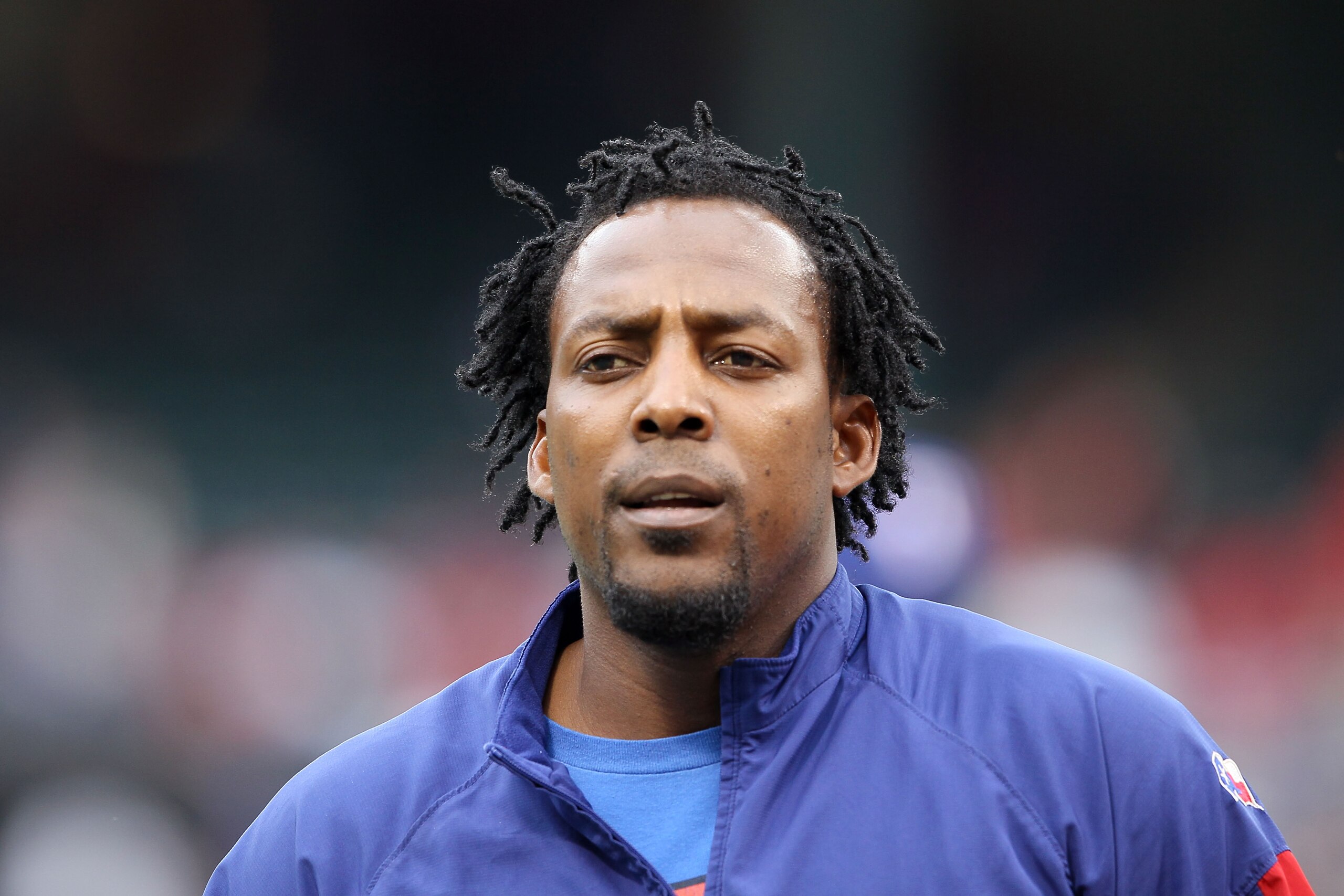 ARLINGTON, TX - OCTOBER 22:  Vladimir Guerrero #27 of the Texas Rangers looks on during batting practice prior to playing the New York Yankees in Game Six of the ALCS during the 2010 MLB Playoffs at Rangers Ballpark in Arlington on October 22, 2010 in Arl