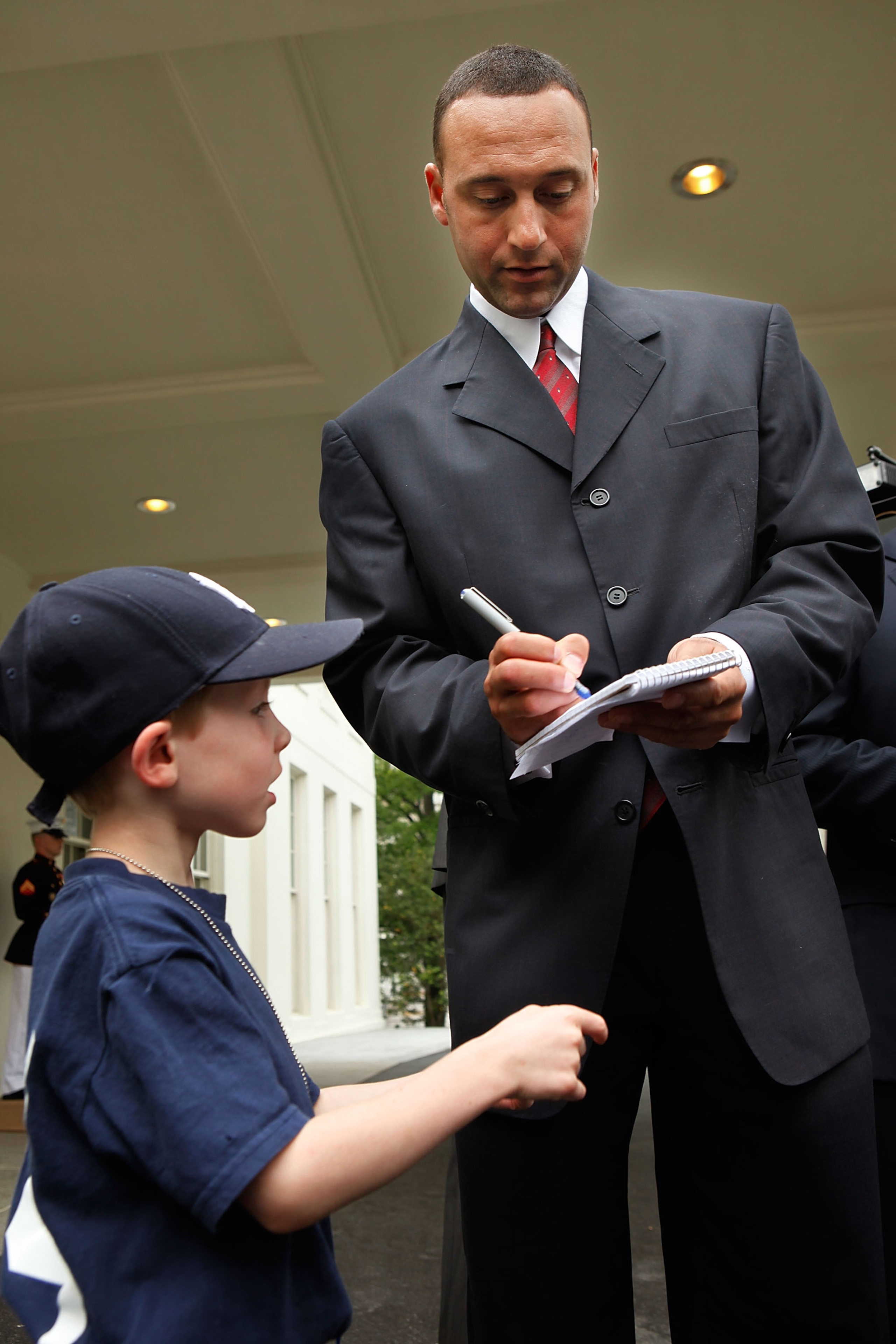 WASHINGTON - APRIL 26: World Series champion New York Yankees player Derek Jeter (R) gives an autograph to six-year-old David Williamson, son of Wall Street Journal reporter Elizabeth Williamson, outside the West Wing of the White House April 26, 2010 in WASHINGTON - APRIL 26: World Series champion New York Yankees player Derek Jeter (R) gives an autograph to six-year-old David Williamson, son of Wall Street Journal reporter Elizabeth Williamson, outside the West Wing of the White House April 26, 2010 in