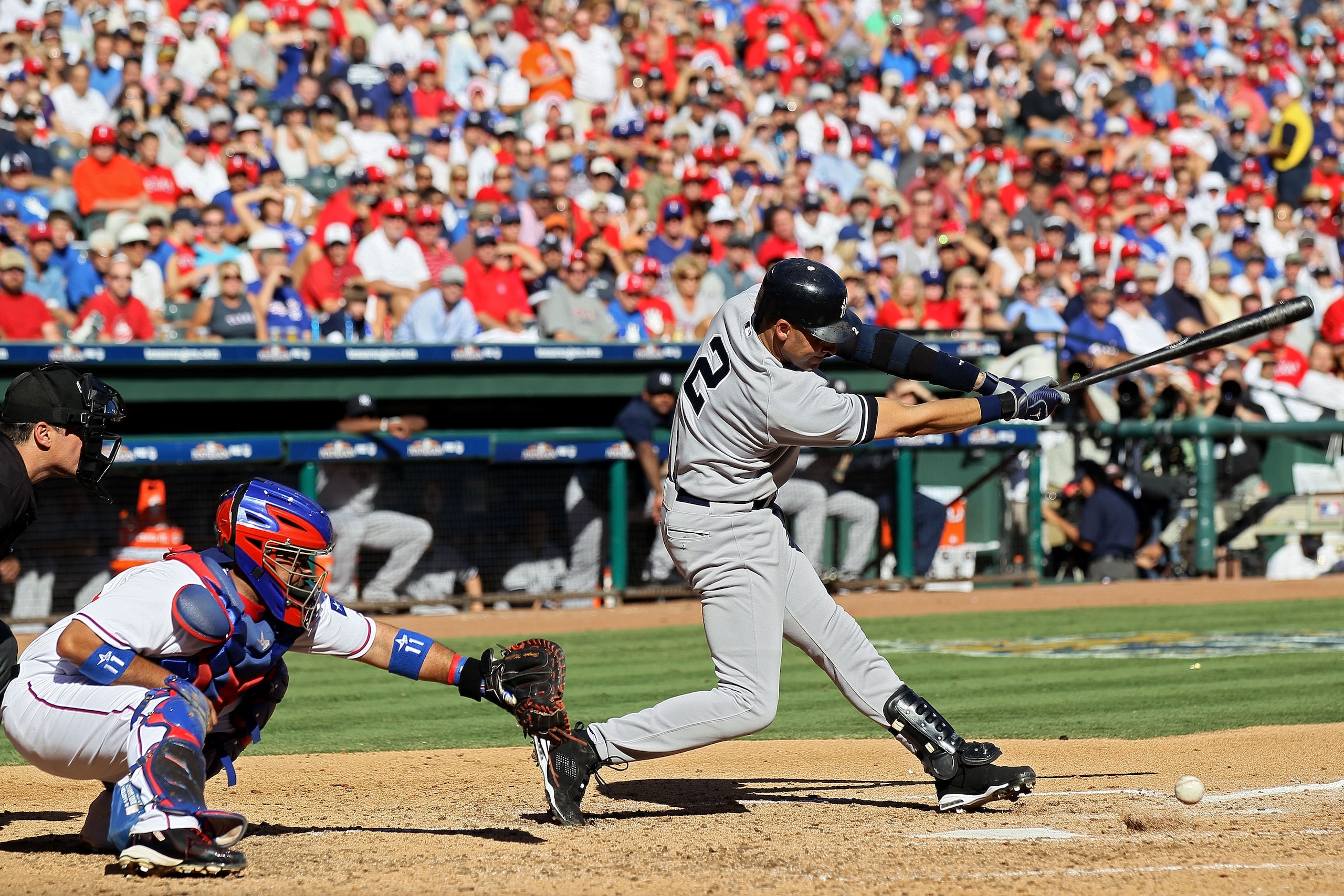 ARLINGTON, TX - OCTOBER 16: Derek Jeter #2 of the New York Yankees hits a single in the third inning against the Texas Rangers in Game Two of the ALCS during the 2010 MLB Playoffs at Rangers Ballpark in Arlington on October 16, 2010 in Arlington, Texas. ARLINGTON, TX - OCTOBER 16: Derek Jeter #2 of the New York Yankees hits a single in the third inning against the Texas Rangers in Game Two of the ALCS during the 2010 MLB Playoffs at Rangers Ballpark in Arlington on October 16, 2010 in Arlington, Texas.