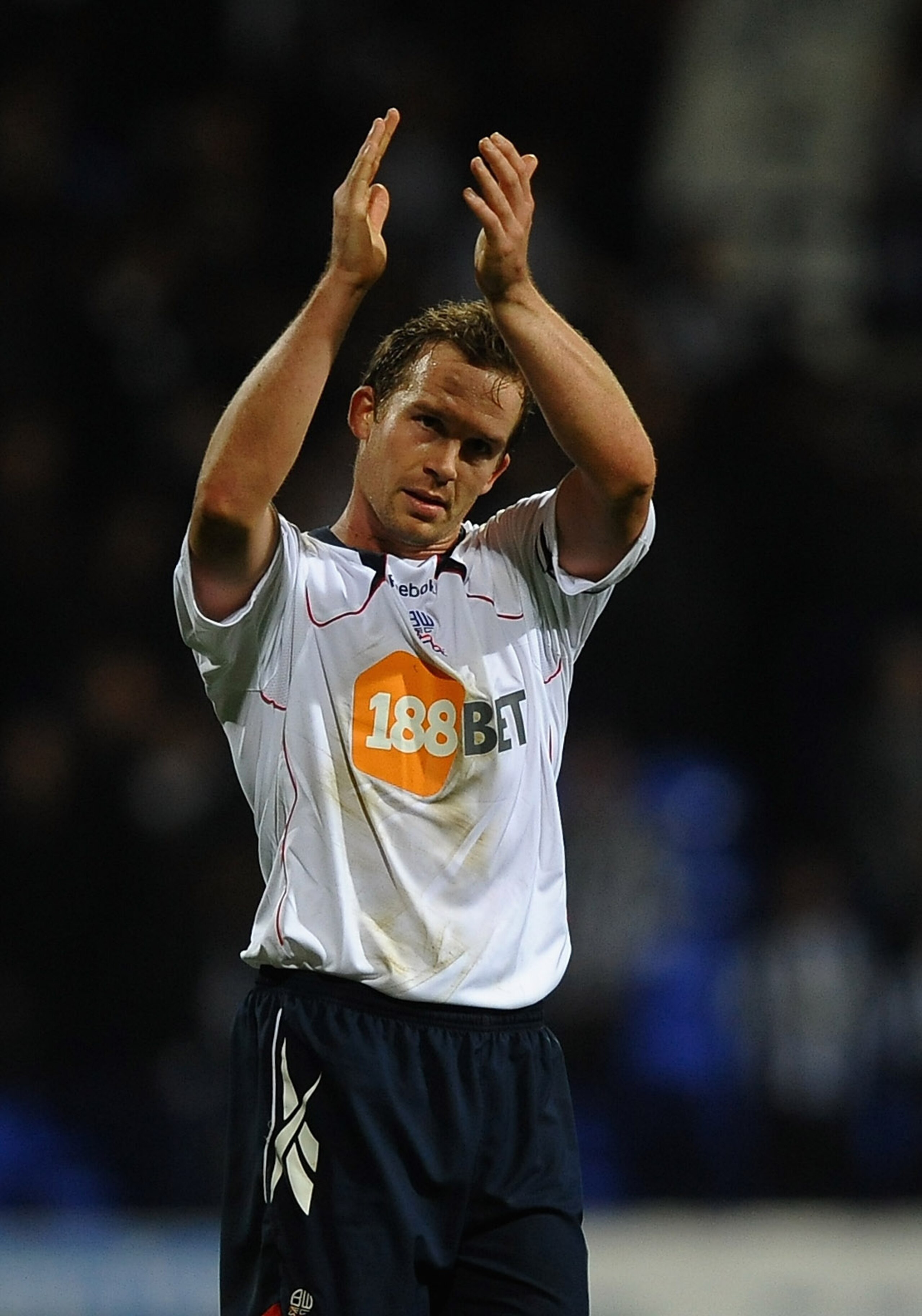 BOLTON, ENGLAND - NOVEMBER 20: Kevin Davies of Bolton Wanderers applauds the fans during the Barclays Premier League match between Bolton Wanderers and Newcastle United at the Reebok Stadium on November 20, 2010 in Bolton, England.  (Photo by Laurence Gri