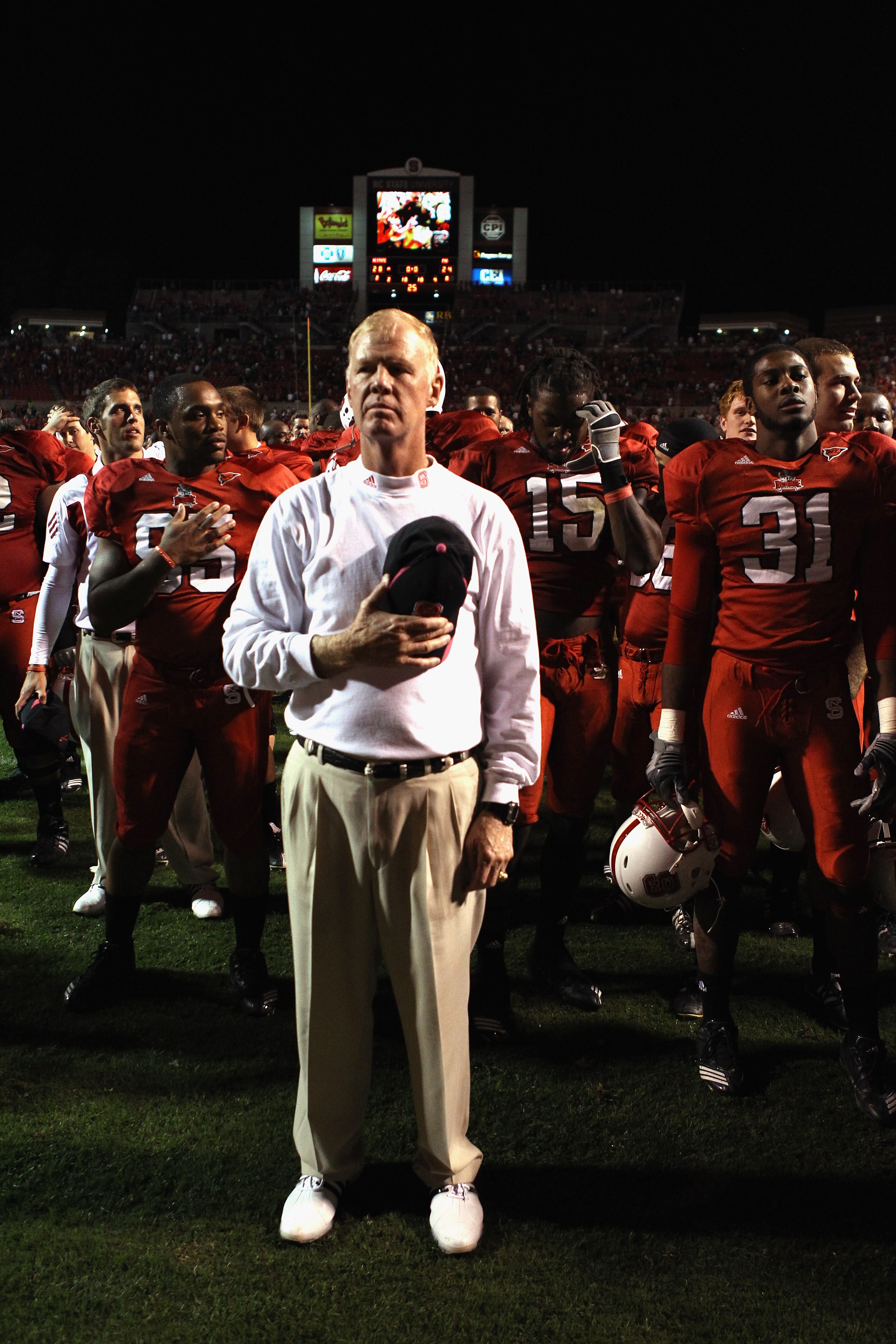 RALEIGH, NC - OCTOBER 28:  Head coach Tom O'Brien of the North Carolina State Wolfpack celebrates with his team after defeating the Florida State Seminoles 28-24 during their game at Carter-Finley Stadium on October 28, 2010 in Raleigh, North Carolina.  (