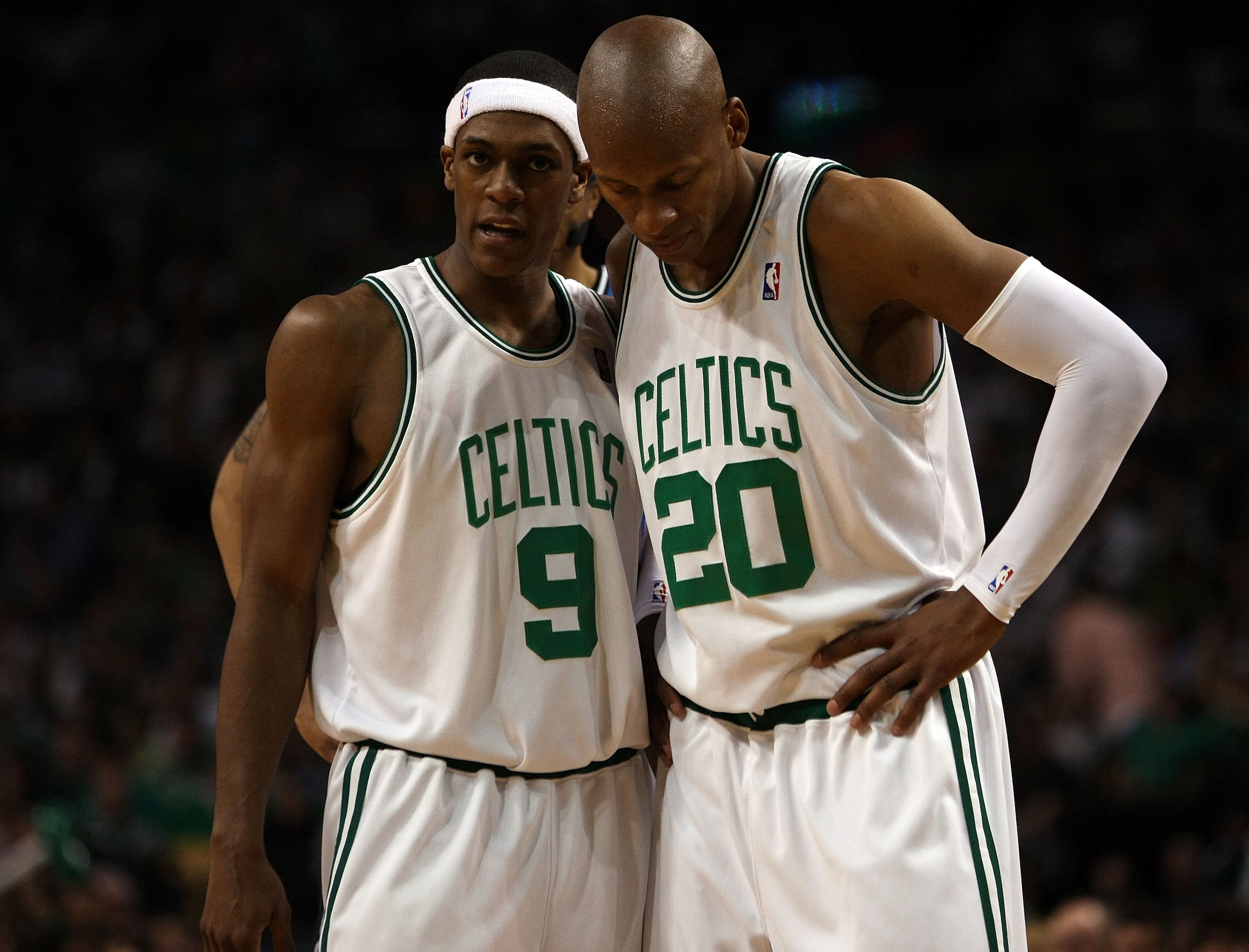 BOSTON - MAY 17: Rajon Rondo #9 and Ray Allen #20 of the Boston Celtics talk as the Orlando Magic shoot a free throw in Game Seven of the Eastern Conference Semifinals during the 2009 NBA Playoffs at TD Banknorth Garden on May 17, 2009 in Boston, Massach BOSTON - MAY 17: Rajon Rondo #9 and Ray Allen #20 of the Boston Celtics talk as the Orlando Magic shoot a free throw in Game Seven of the Eastern Conference Semifinals during the 2009 NBA Playoffs at TD Banknorth Garden on May 17, 2009 in Boston, Massach