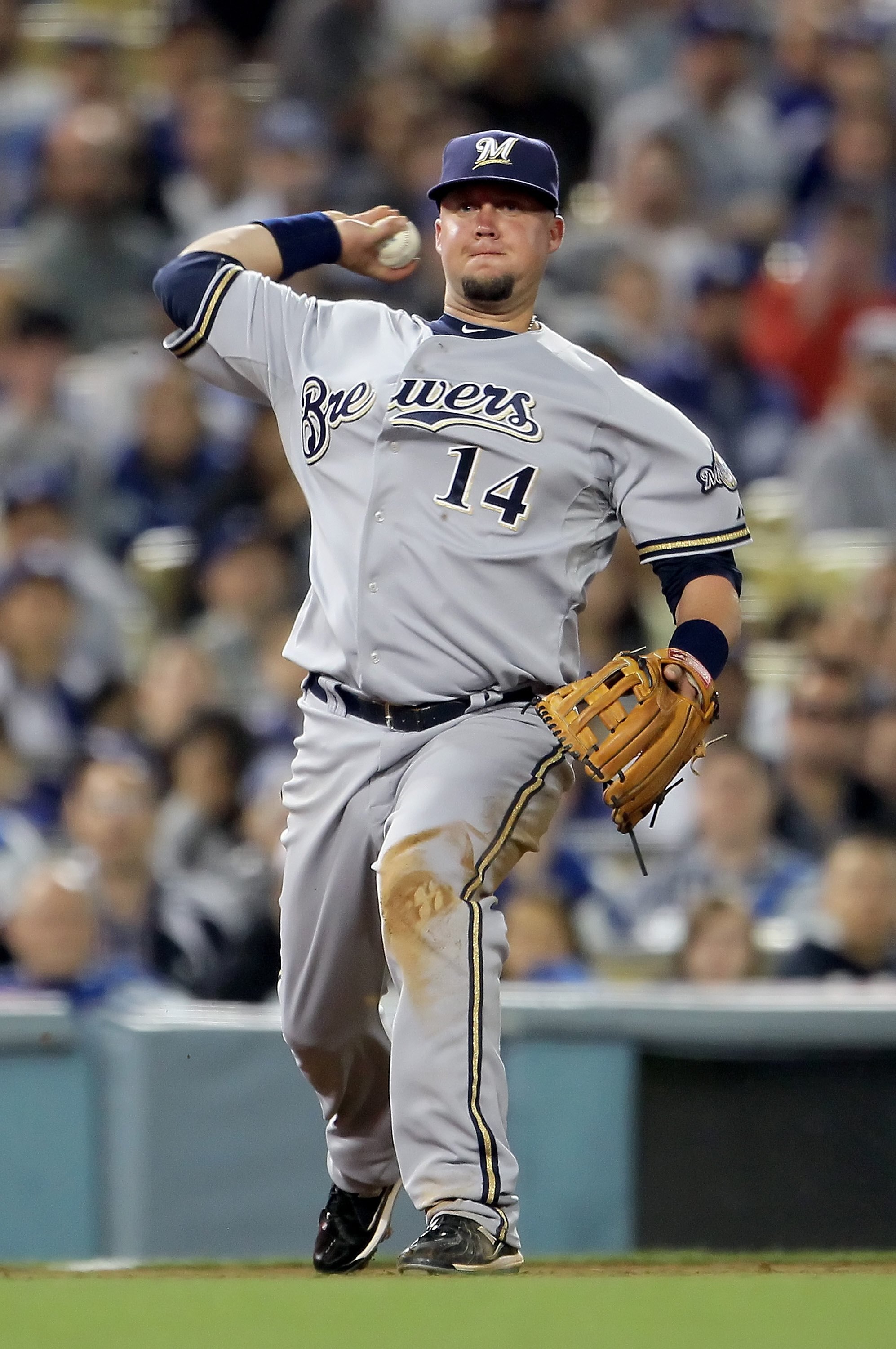 LOS ANGELES, CA - MAY 04:  Casey McGehee #14 of the Milwaukee Brewers throws to first base against the Los Angeles Dodgers at Dodger Stadium on May 4, 2010 in Los Angeles, California. The Brewers defeated the Dodgers 11-6.  (Photo by Jeff Gross/Getty Imag