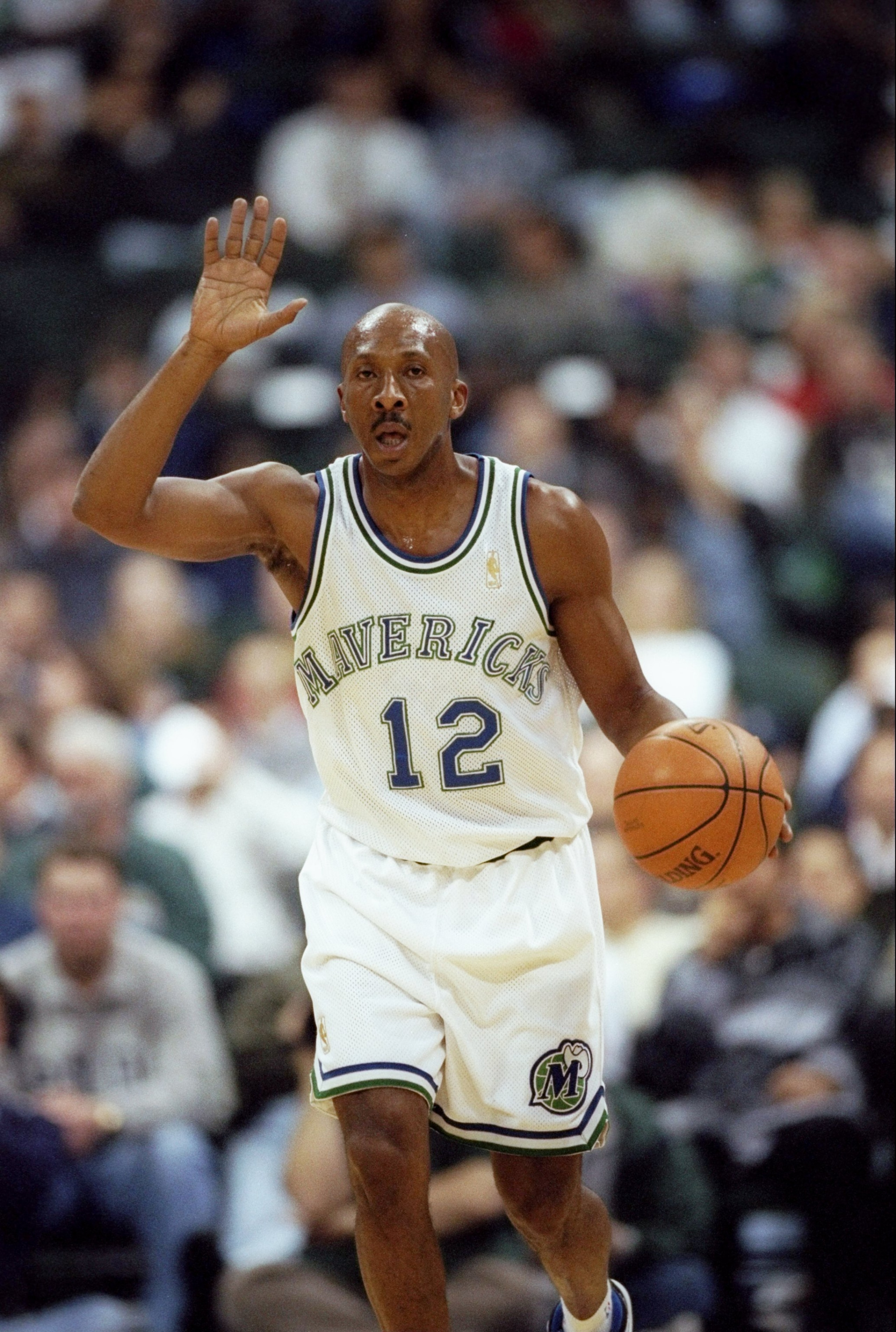 25 Feb 1997: Guard Derek Harper of the Dallas Mavericks moves the ball during a game against the Charlotte Hornets at the Reunion Arena in Dallas, Texas. The Mavericks won the game, 86-84. Mandatory Credit: Stephen Dunn /Allsport 25 Feb 1997: Guard Derek Harper of the Dallas Mavericks moves the ball during a game against the Charlotte Hornets at the Reunion Arena in Dallas, Texas. The Mavericks won the game, 86-84. Mandatory Credit: Stephen Dunn /Allsport