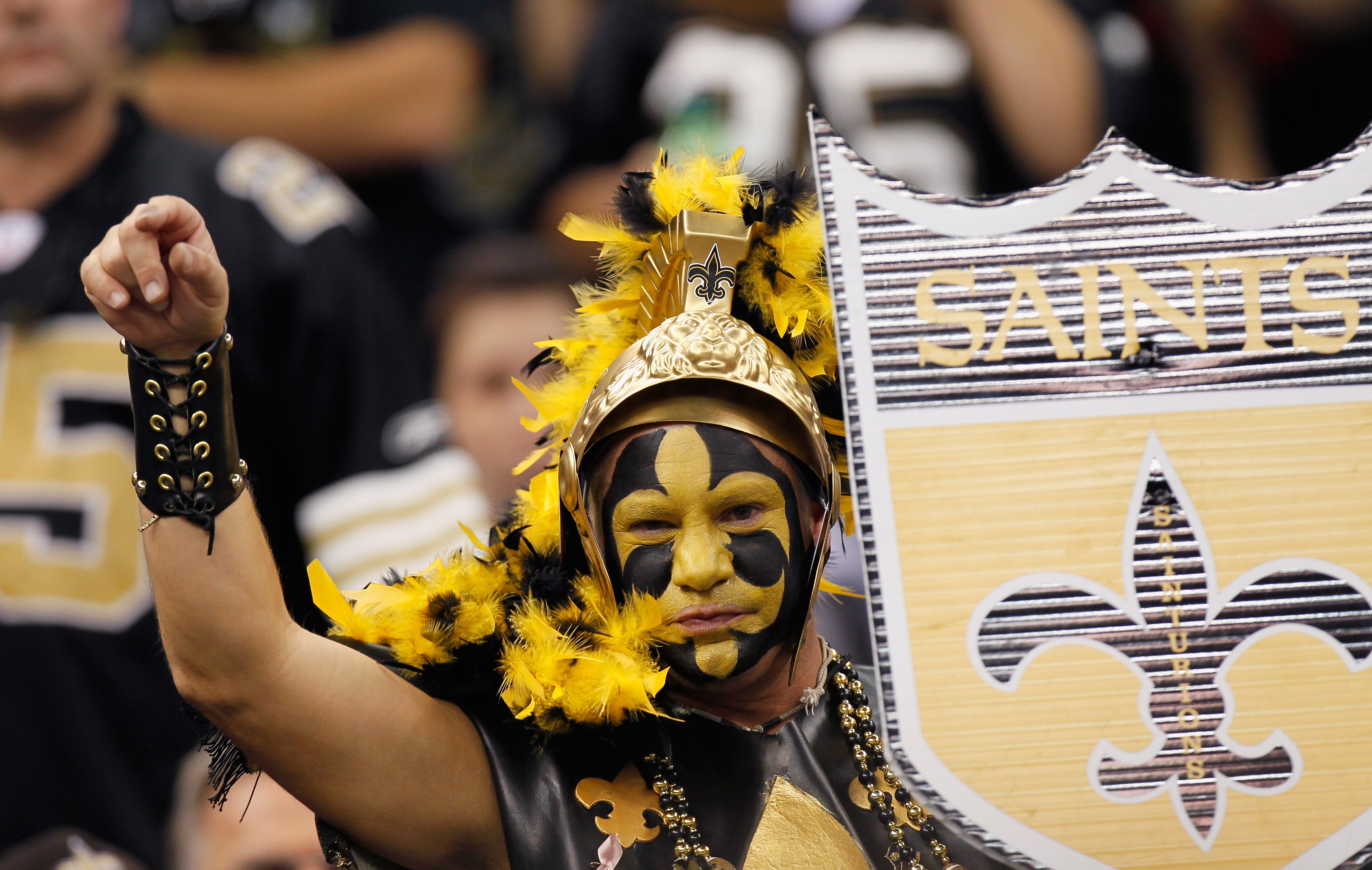 NEW ORLEANS - NOVEMBER 21:  A fan of the New Orleans Saints cheers against the Seattle Seahawks at Louisiana Superdome on November 21, 2010 in New Orleans, Louisiana.  (Photo by Kevin C. Cox/Getty Images)