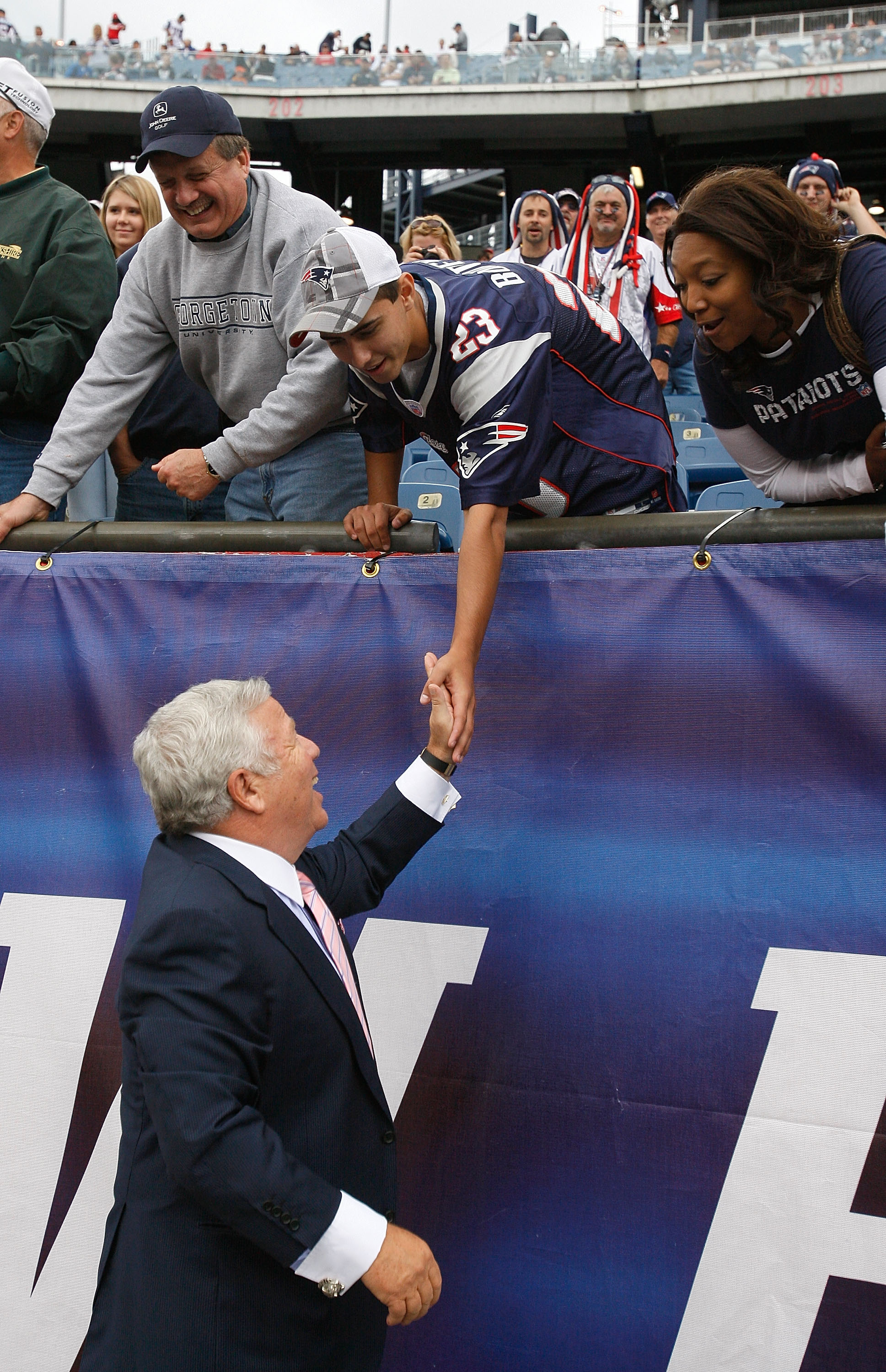 FOXBORO, MA - SEPTEMBER 12: Owner Robert Kraft of the New England Patriots shakes hands with fans before the NFL season opener against the Cincinnati Bengals at Gillette Stadium on September 12, 2010 in Foxboro, Massachusetts. (Photo by Jim Rogash/Getty I