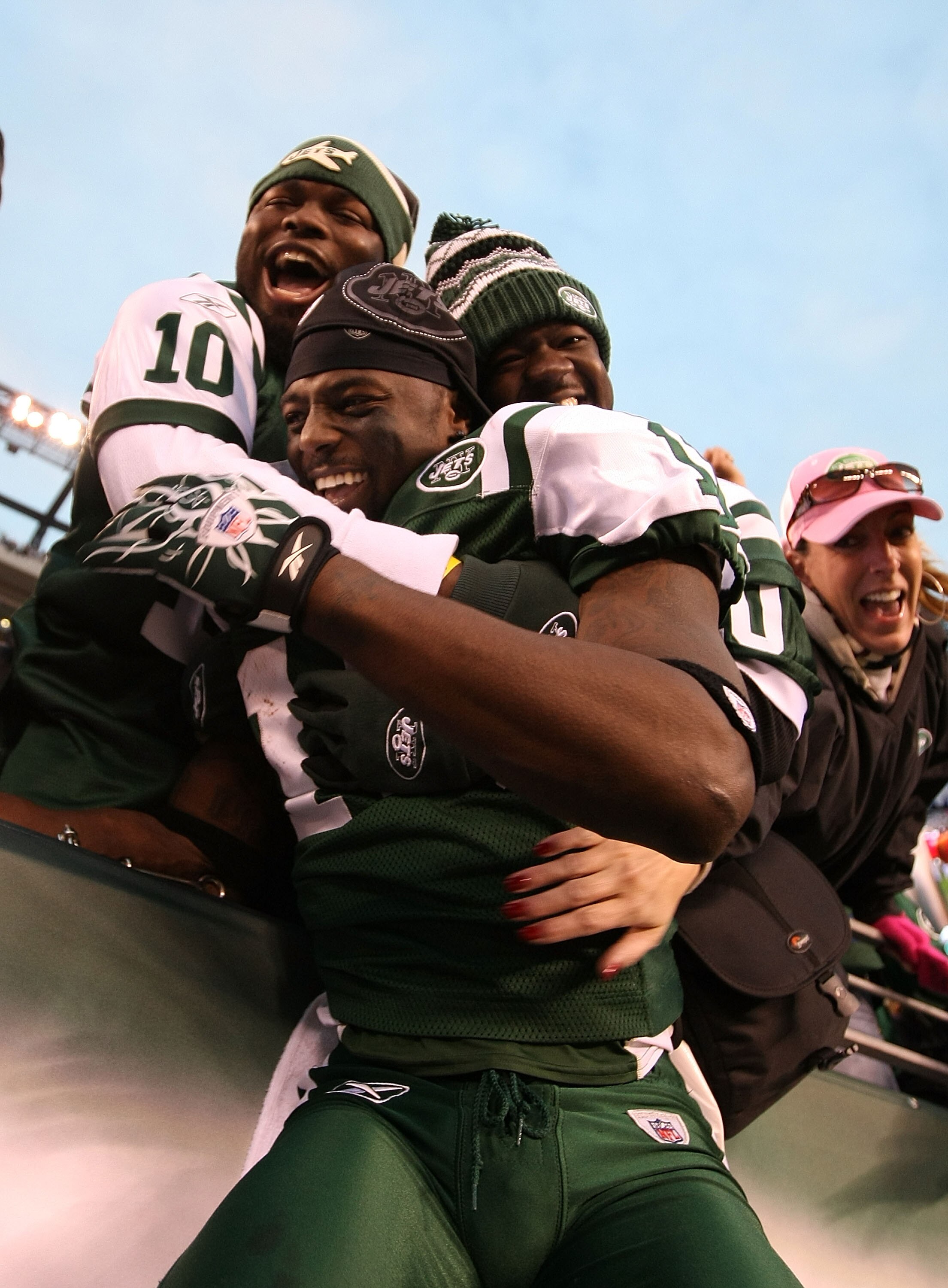 EAST RUTHERFORD, NJ - NOVEMBER 21:  Santonio Holmes #10 of the New York Jets celebrates with fans after scoring the winning  touchdown against  the Houston Texans during the fourth quarter of their  game on November 21, 2010 at the New Meadowlands Stadium