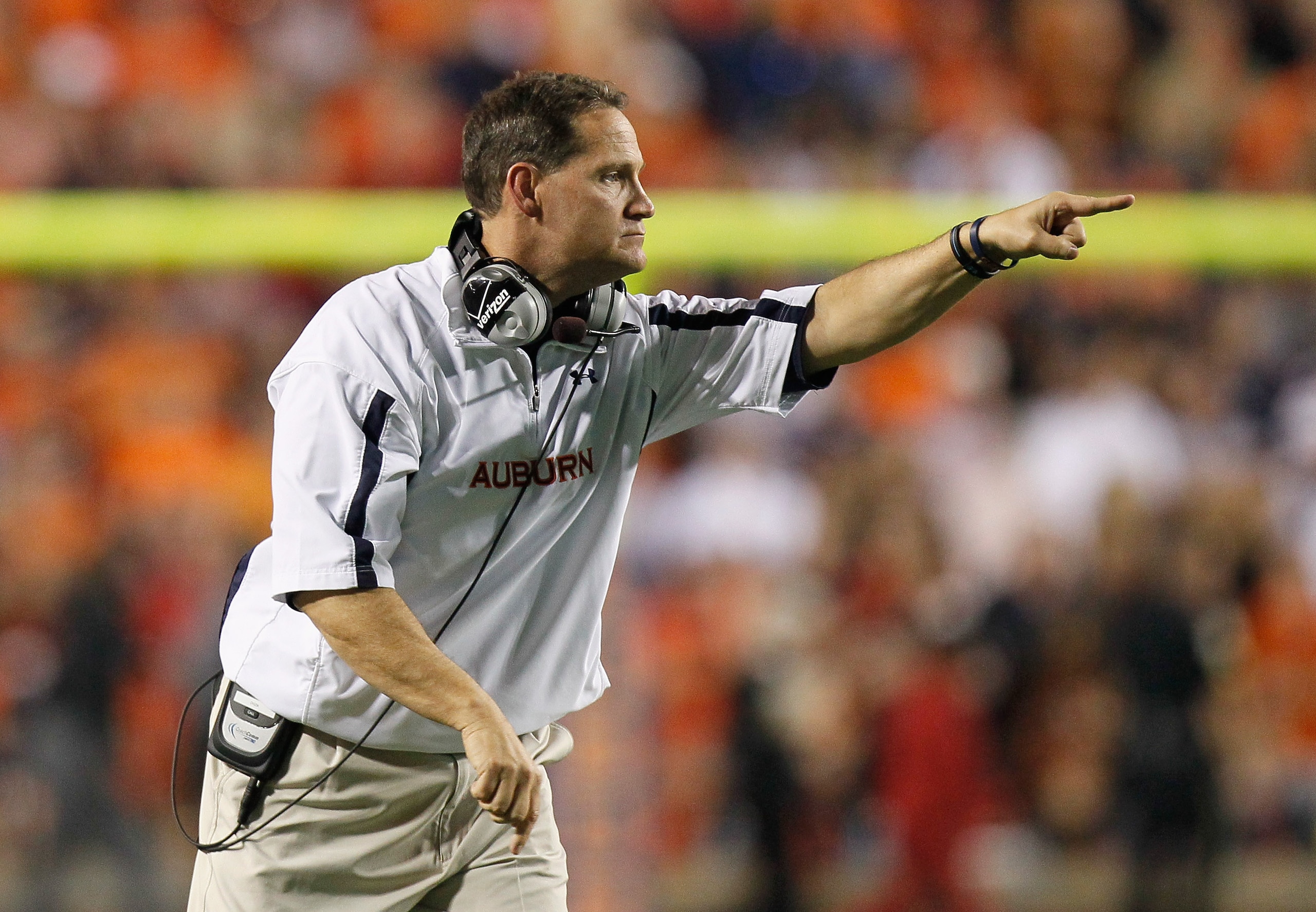 AUBURN, AL - NOVEMBER 13: Head coach Gene Chizik of the Auburn Tigers points to his offense during the game against the Georgia Bulldogs at Jordan-Hare Stadium on November 13, 2010 in Auburn, Alabama. (Photo by Kevin C. Cox/Getty Images) AUBURN, AL - NOVEMBER 13: Head coach Gene Chizik of the Auburn Tigers points to his offense during the game against the Georgia Bulldogs at Jordan-Hare Stadium on November 13, 2010 in Auburn, Alabama. (Photo by Kevin C. Cox/Getty Images)