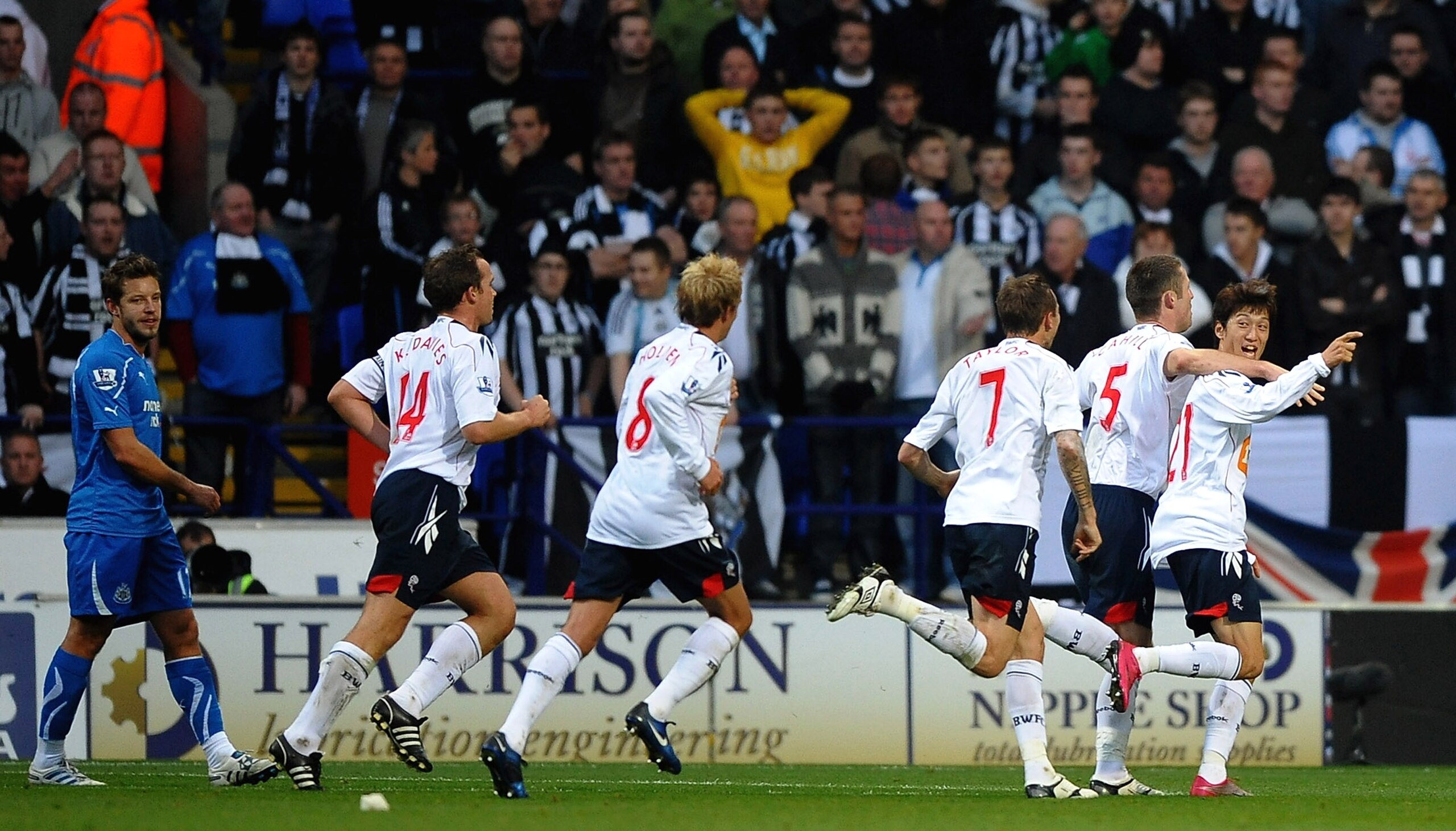 BOLTON, ENGLAND - NOVEMBER 20:  C Y Lee of Bolton Wanderers celebrates scoring the second goal during the Barclays Premier League match between Bolton Wanderers and Newcastle United at the Reebok Stadium on November 20, 2010 in Bolton, England.  (Photo by