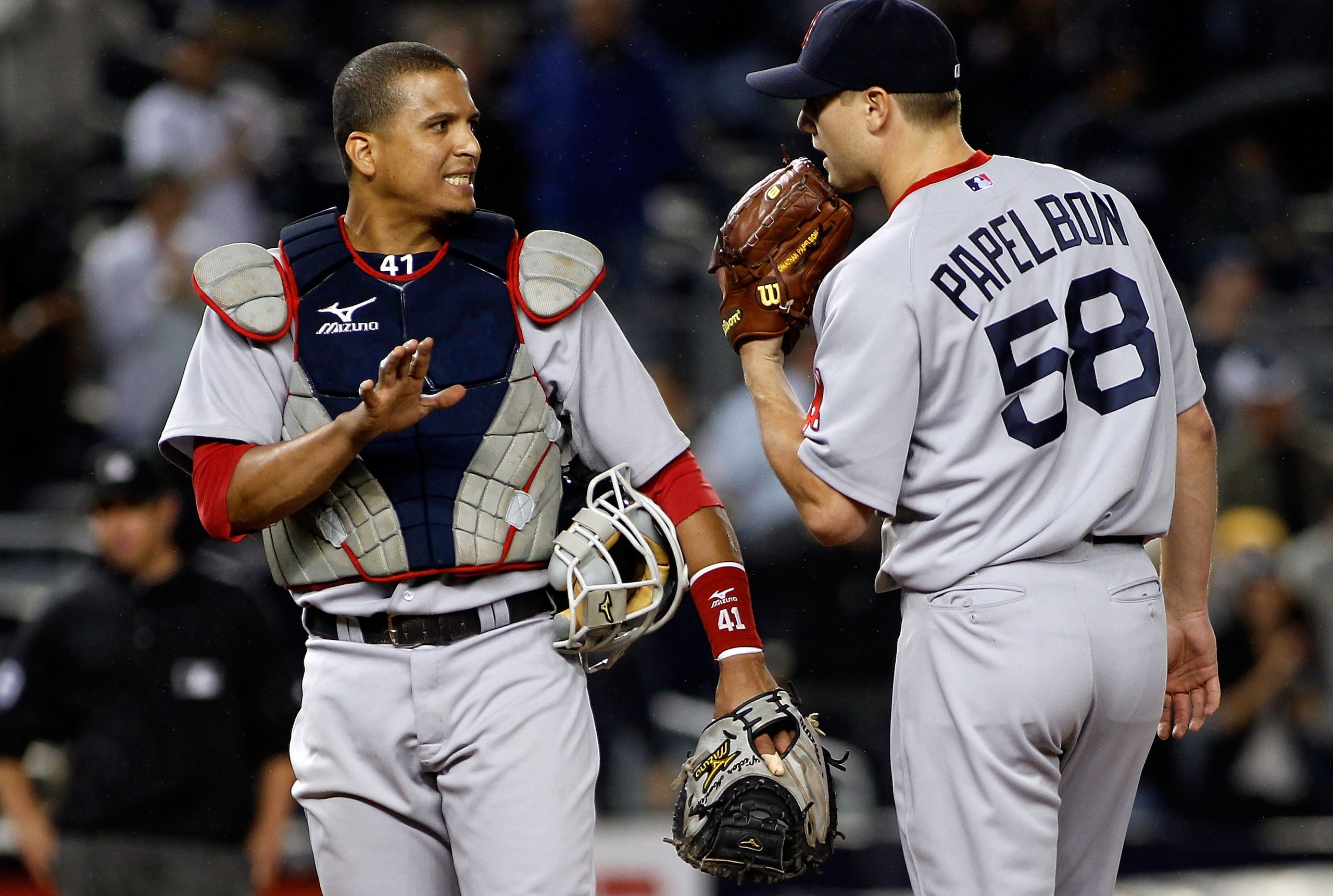 NEW YORK - SEPTEMBER 26: Catcher Victor Martinez #41 of the Boston Red Sox talks to pitcher Jonathan Papelbon #58 during the ninth-inning aganinst the New York Yankees bunt attempt in the 10th inning on September 26, 2010 at Yankee Stadium in the Bronx b NEW YORK - SEPTEMBER 26: Catcher Victor Martinez #41 of the Boston Red Sox talks to pitcher Jonathan Papelbon #58 during the ninth-inning aganinst the New York Yankees bunt attempt in the 10th inning on September 26, 2010 at Yankee Stadium in the Bronx b