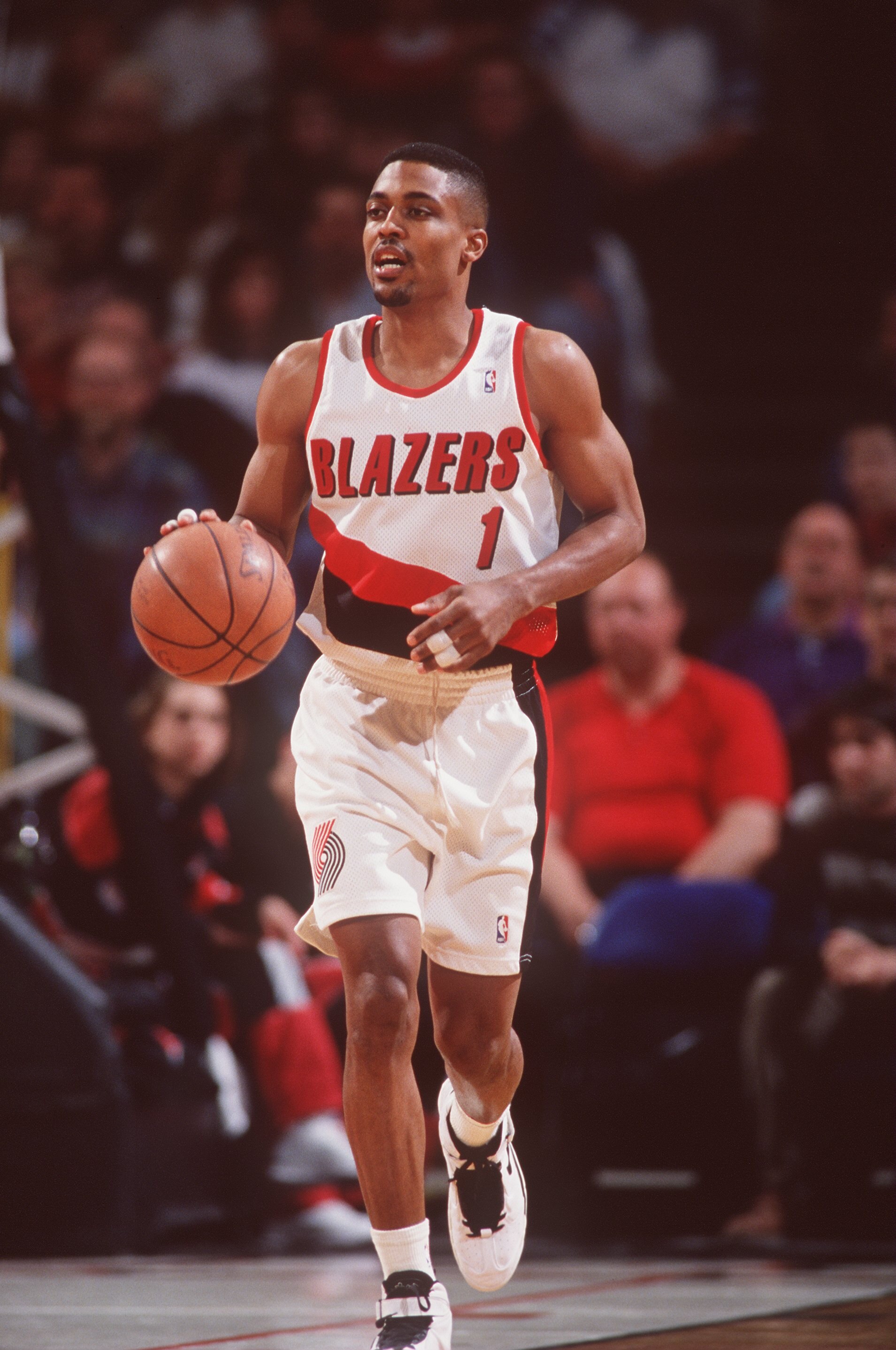 24 Feb 1995:  Point guard Rod Strickland of the Portland Trailblazers dribbles the ball up court during the Trailblazers 114-101 victory over the Utah Jazz at the Portland Coliseum in Portland, Oregon.   Mandatory Credit: Otto Greule/ALLSPORT