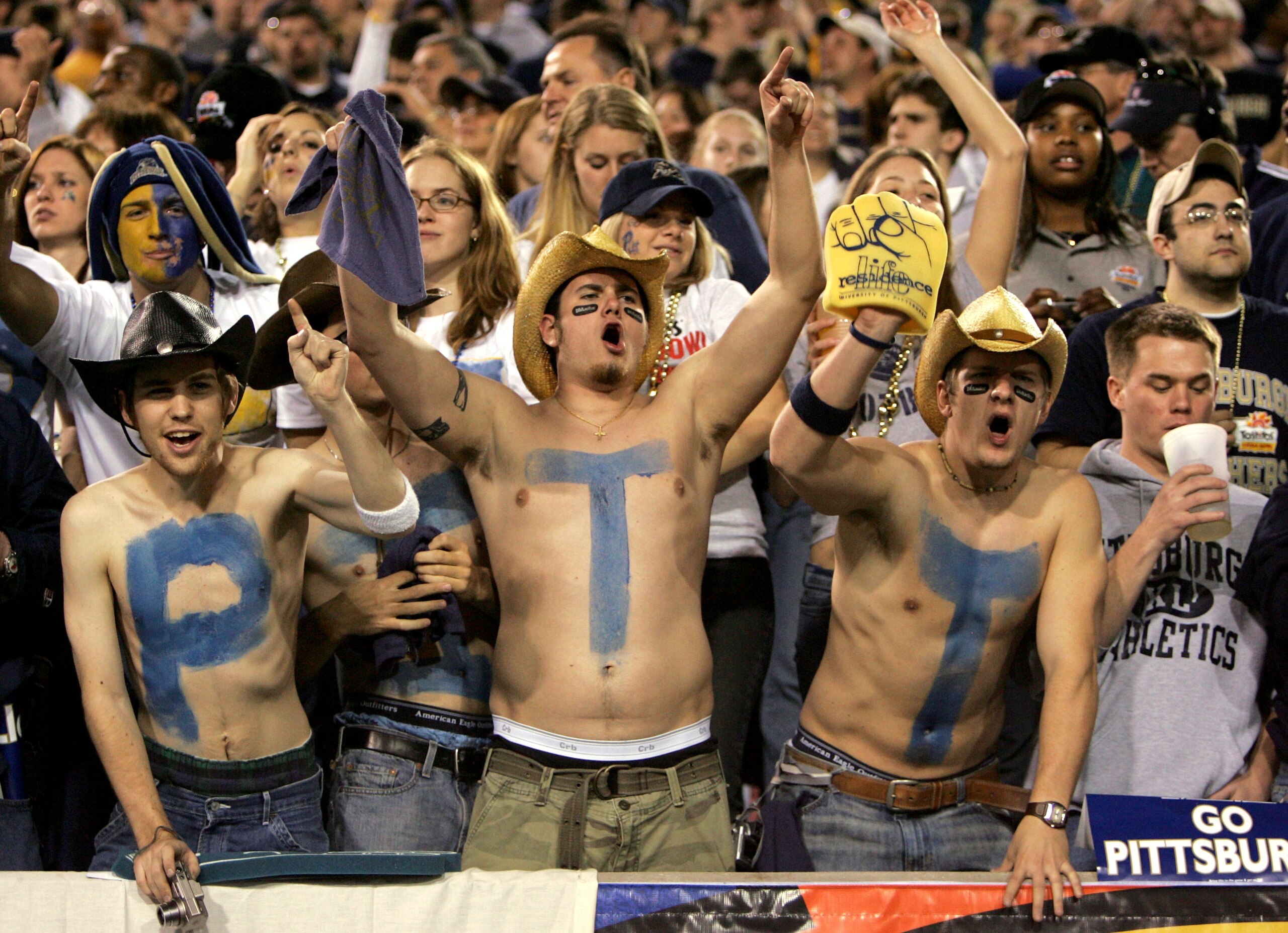 TEMPE, AZ - JANUARY 1:  Pittsburgh fans cheer on their team during the game against Utah in the Tostito's Fiesta Bowl at the Sun Devil Stadium on January 1, 2005 in Tempe, Arizona. Utah won the game 35-7. (Photo by Jeff Gross/Getty Images).