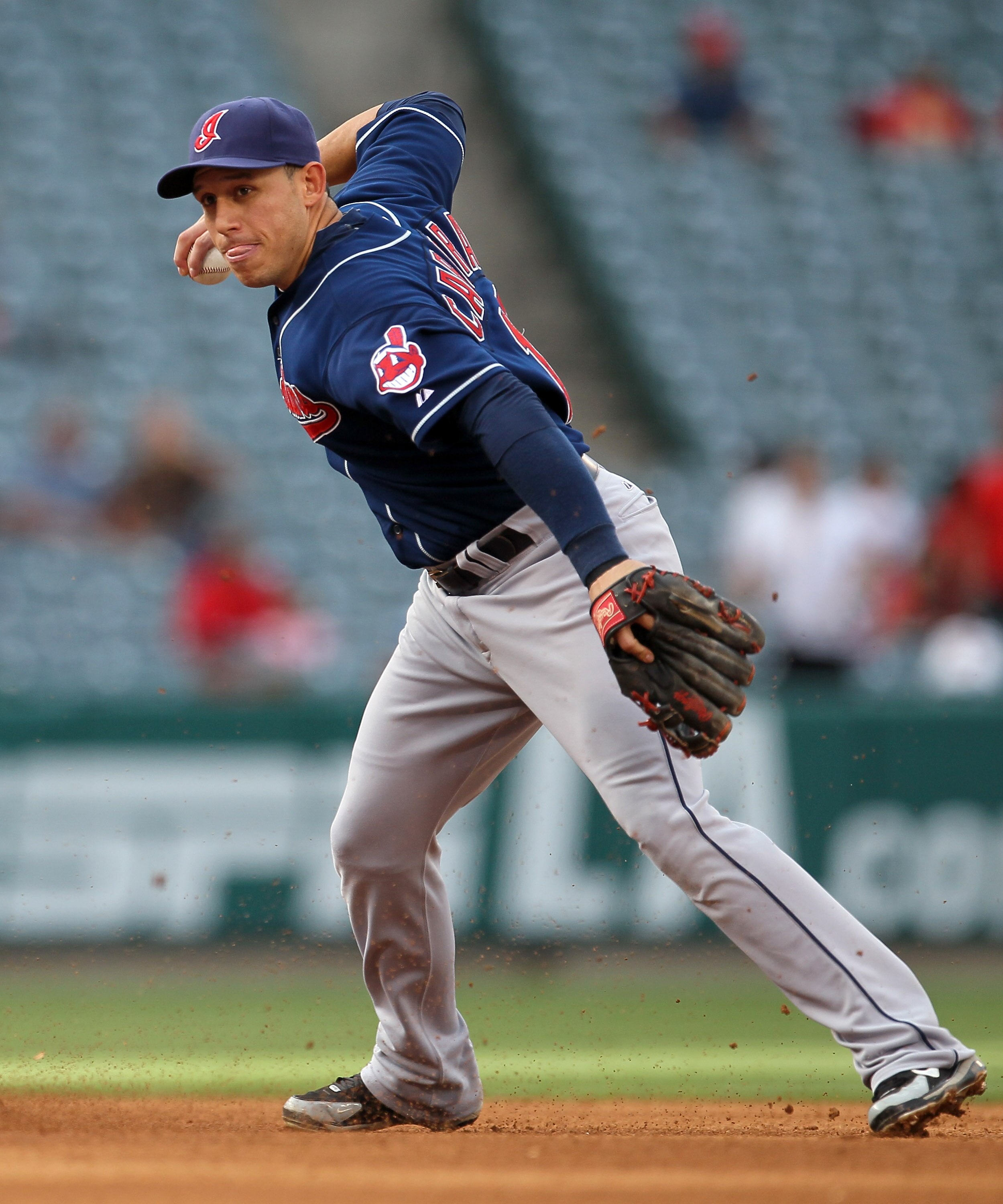 ANAHEIM, CA - SEPTEMBER 8:  Astrubal Cabrera #13 of the Cleveland Indians turns a double play against  the Los Angeles Angels of Anaheim on September 8, 2010 at Angel Stadium in Anaheim, California.   The Angels won 4-3 in 16 innings. (Photo by Stephen Du