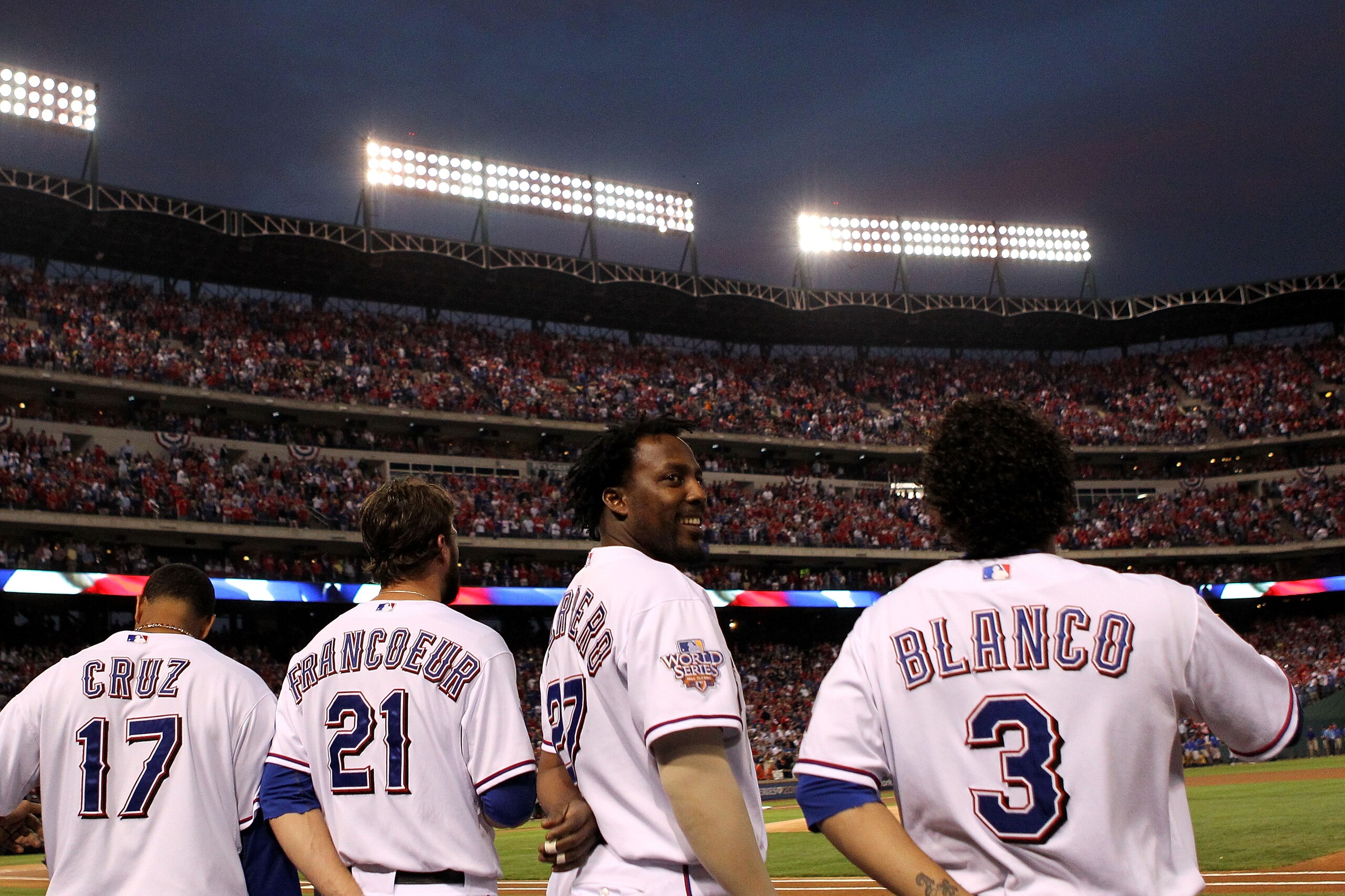 ARLINGTON, TX - NOVEMBER 01:  (L-R) Nelson Cruz #17, Jeff Francoeur #21, Vladimir Guerrero #27 and Elvis Andrus #1 of the Texas Rangers stand for the performance of the National Anthem against the San Francisco Giants in Game Five of the 2010 MLB World Se