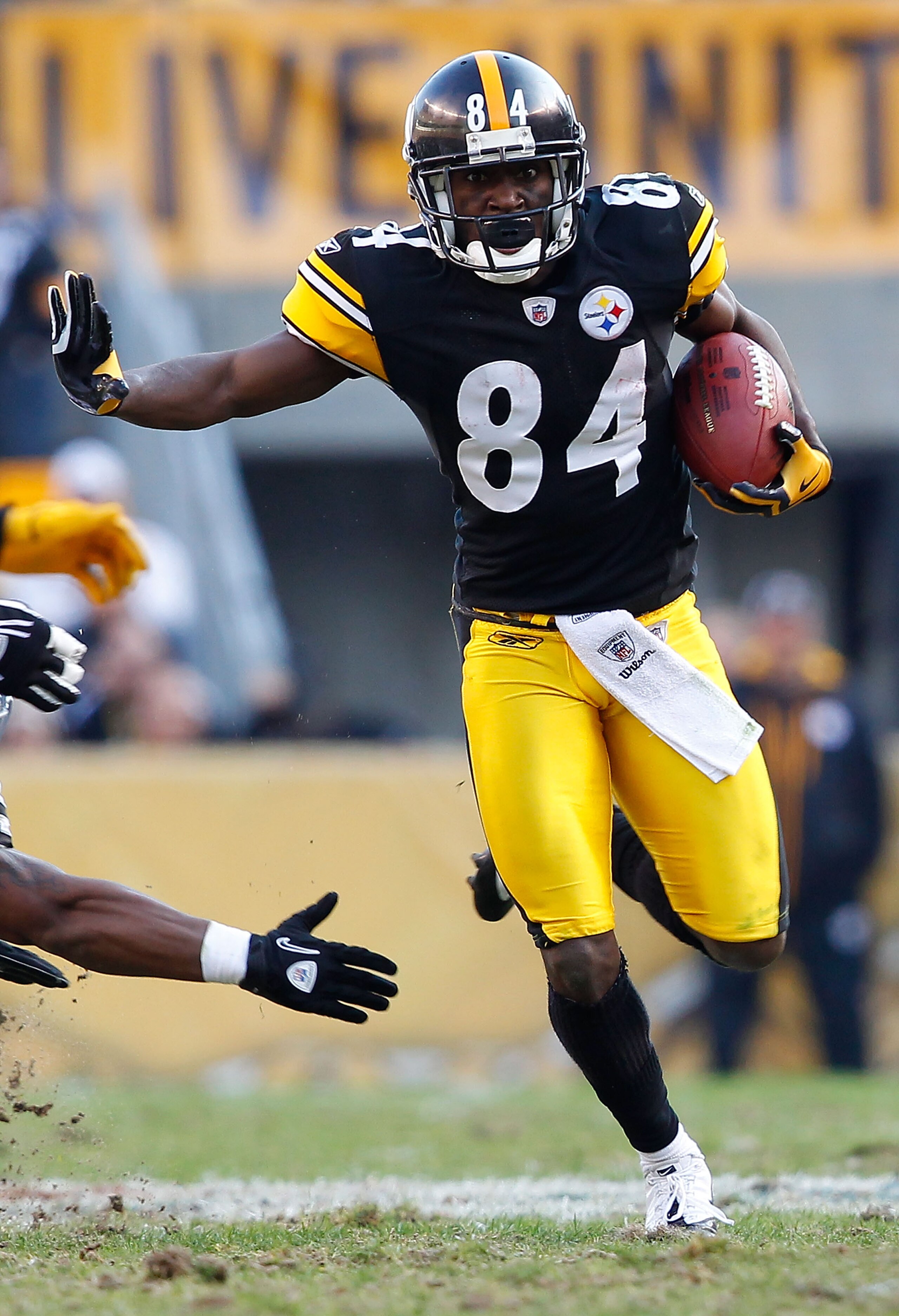PITTSBURGH - NOVEMBER 21: Antonio Brown #84 of the Pittsburgh Steelers evades tacklers during a punt return against the Oakland Raiders during the game on November 21, 2010 at Heinz Field in Pittsburgh, Pennsylvania. (Photo by Jared Wickerham/Getty Imag PITTSBURGH - NOVEMBER 21: Antonio Brown #84 of the Pittsburgh Steelers evades tacklers during a punt return against the Oakland Raiders during the game on November 21, 2010 at Heinz Field in Pittsburgh, Pennsylvania. (Photo by Jared Wickerham/Getty Imag