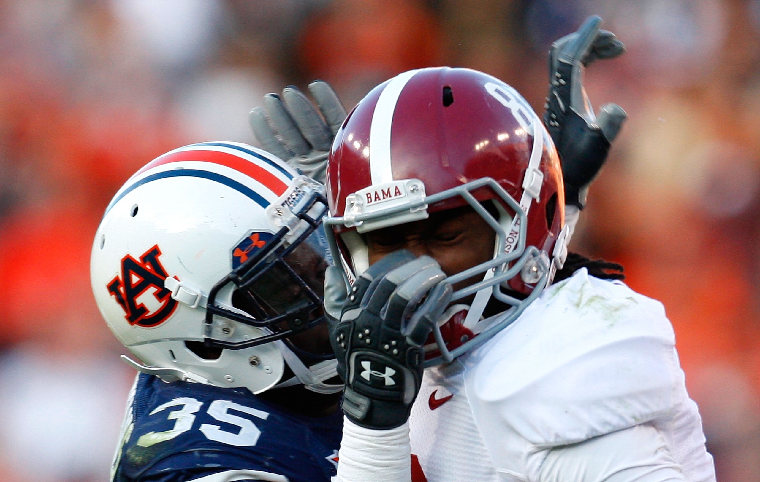 AUBURN, AL - NOVEMBER 27: Julio Jones #8 of the Alabama Crimson Tide draws a facemask penalty from Jonathan Evans #35 of the Auburn Tigers at Jordan-Hare Stadium on November 27, 2009 in Auburn, Alabama. (Photo by Kevin C. Cox/Getty Images) AUBURN, AL - NOVEMBER 27: Julio Jones #8 of the Alabama Crimson Tide draws a facemask penalty from Jonathan Evans #35 of the Auburn Tigers at Jordan-Hare Stadium on November 27, 2009 in Auburn, Alabama. (Photo by Kevin C. Cox/Getty Images)