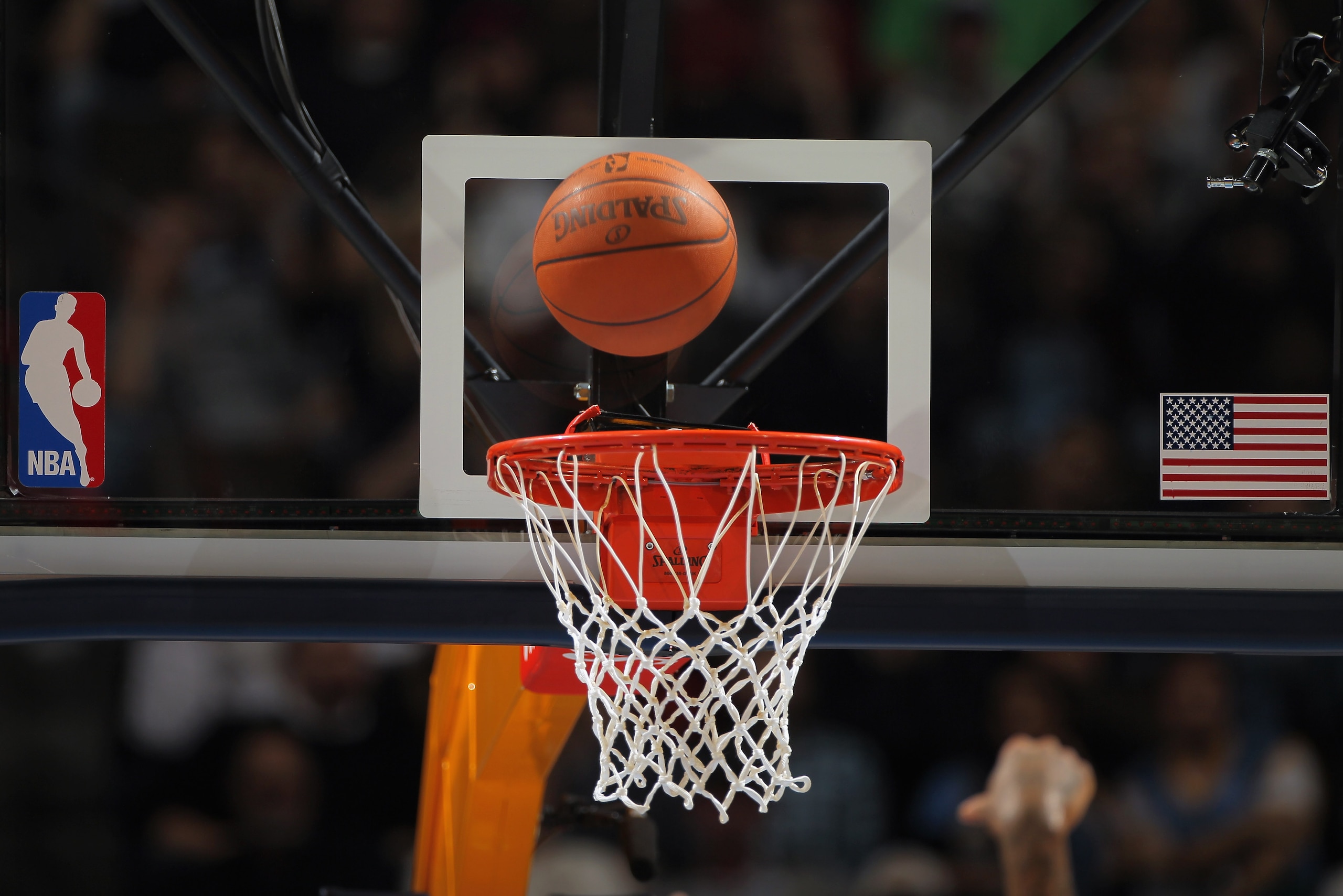DENVER - NOVEMBER 16:  A detail photo of the ball as it falls through the rim as the Denver Nuggets face the New York Knicks at the Pepsi Center on November 16, 2010 in Denver, Colorado. The Nuggets defeated the Knicks 120-118. NOTE TO USER: User expressl