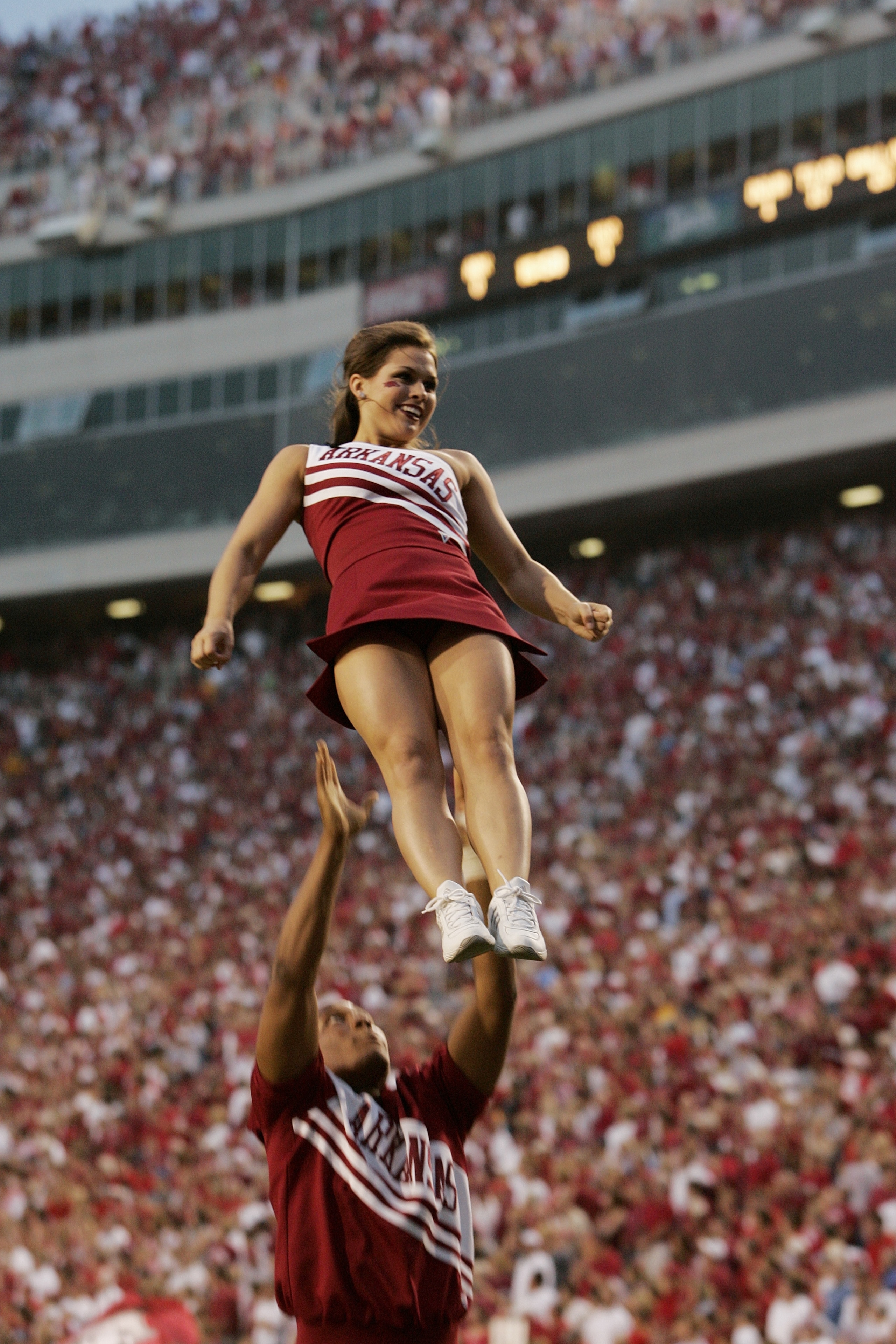 FAYETTEVILLE, AR - SEPTEMBER 2:  Cheerleaders of the Arkansas Razorbacks perform before the game against the University of Southern California Trojans on September 2, 2006 at Donald W. Reynolds Razorback Stadium in Fayetteville, Arkansas.  Southern Califo