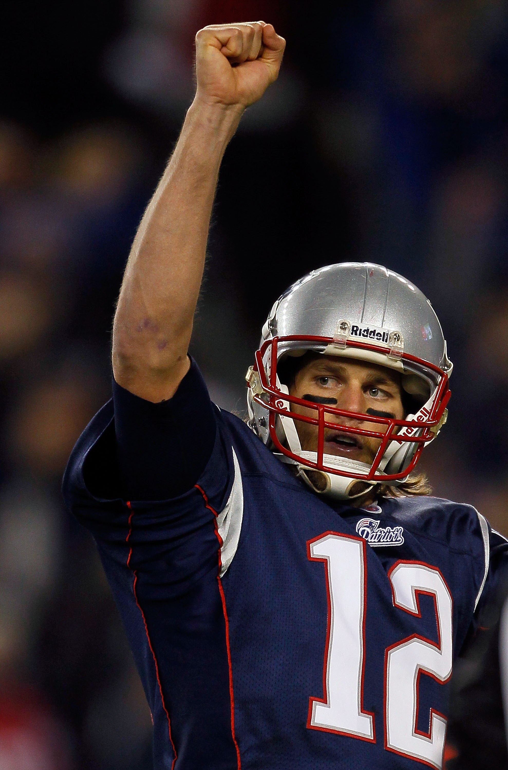 FOXBORO, MA - NOVEMBER 21: Tom Brady #12 of the New England Patriots reacts after teammate BenJarvis Green-Ellis runs the ball in for a touchdown in the second half at Gillette Stadium on November 21, 2010 in Foxboro, Massachusetts. (Photo by Jim Rogash/G