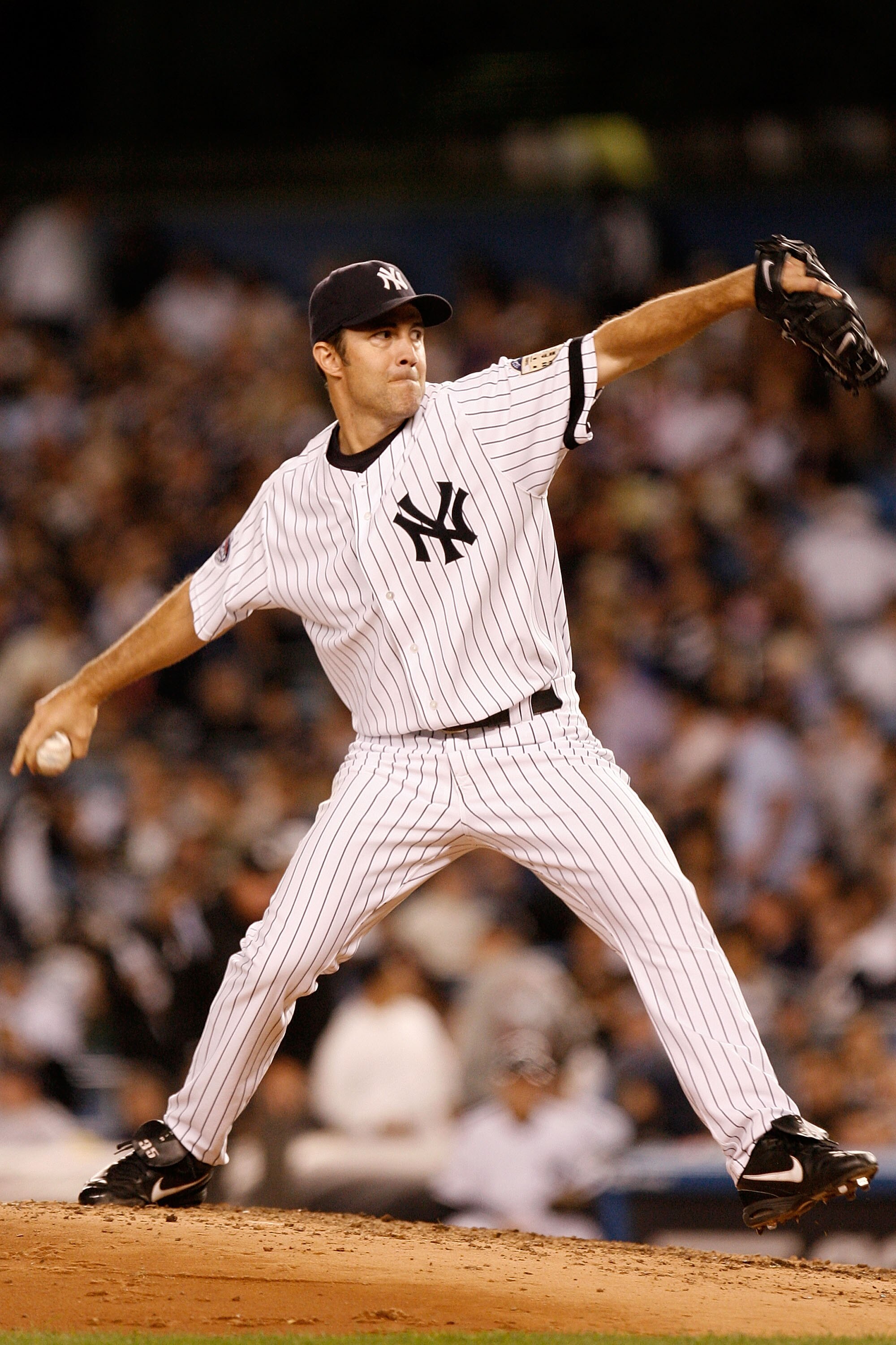 NEW YORK - SEPTEMBER 18:  Mike Mussina #35 of the New York Yankees pitches in the fifth inning against the Chicago White Sox on September 18, 2008 at Yankee Stadium in the Bronx borough of New York City.  (Photo by Jarrett Baker/Getty Images)