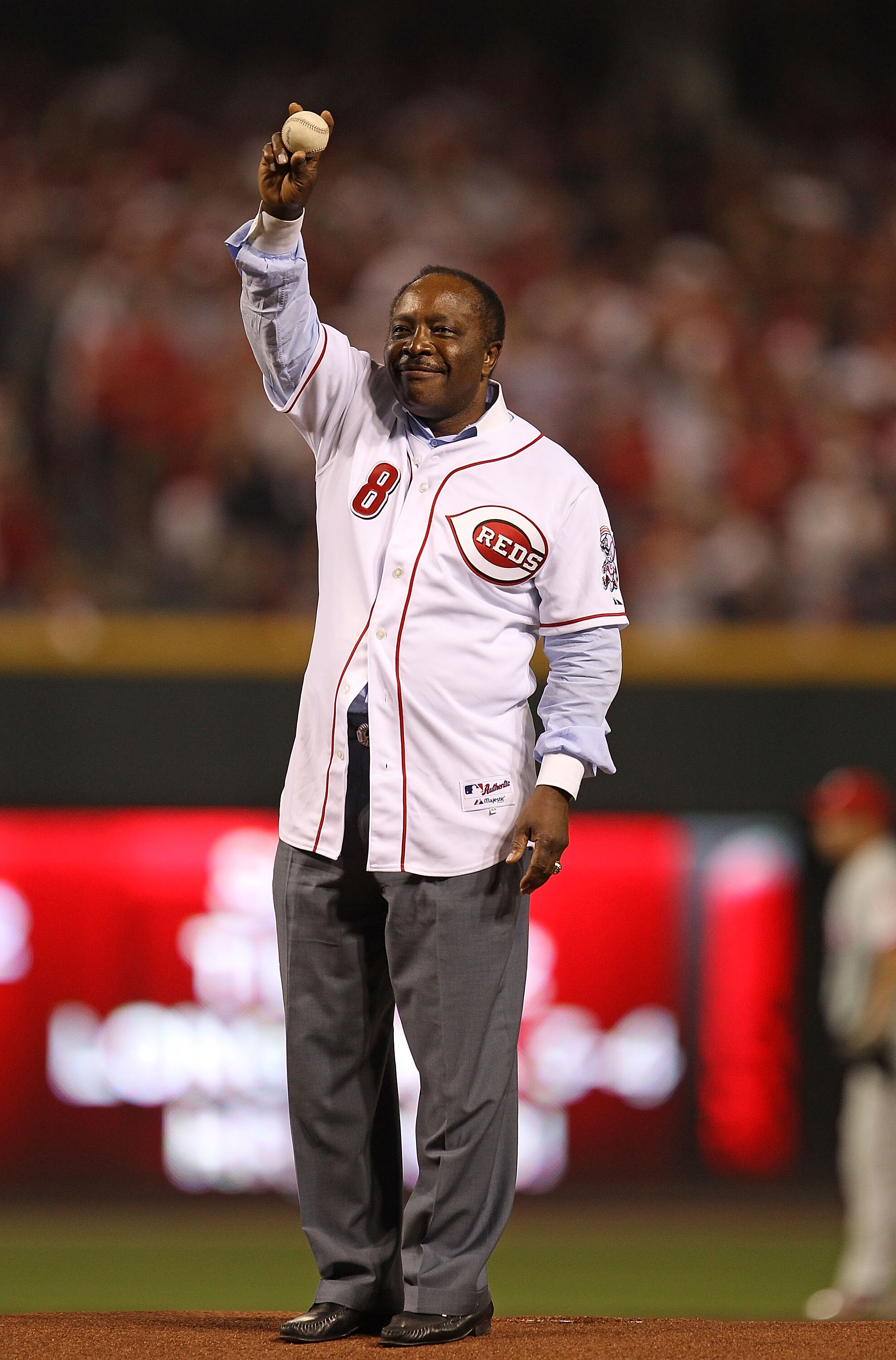 CINCINNATTI - OCTOBER 10: Former player Joe Morgan waves to the crowd before throwing out a ceremonial first pitch when the Philadelphia Phillies take on the Cincinnati Reds during game 3 of the NLDS at Great American Ball Park on October 10, 2010 in Cinc