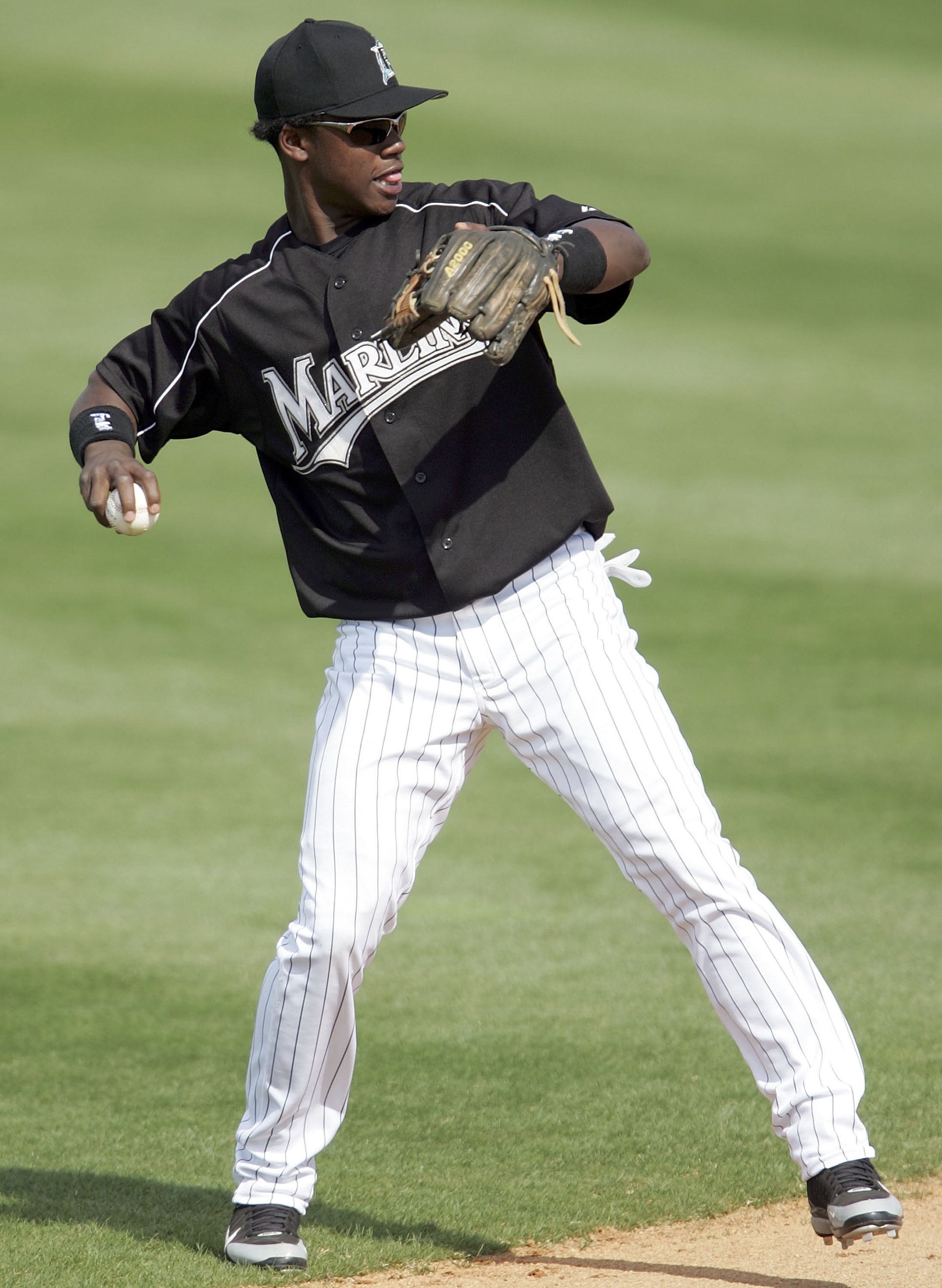 JUPITER, FL - MARCH 03:  Hanley Ramirez #2 of the Florida Marlins throws the ball to first base during the Major League Baseball Spring Training game against the Baltimore Orioles on March 3, 2006 at Roger Dean Stadium in Jupiter, Florida. The Marlins def