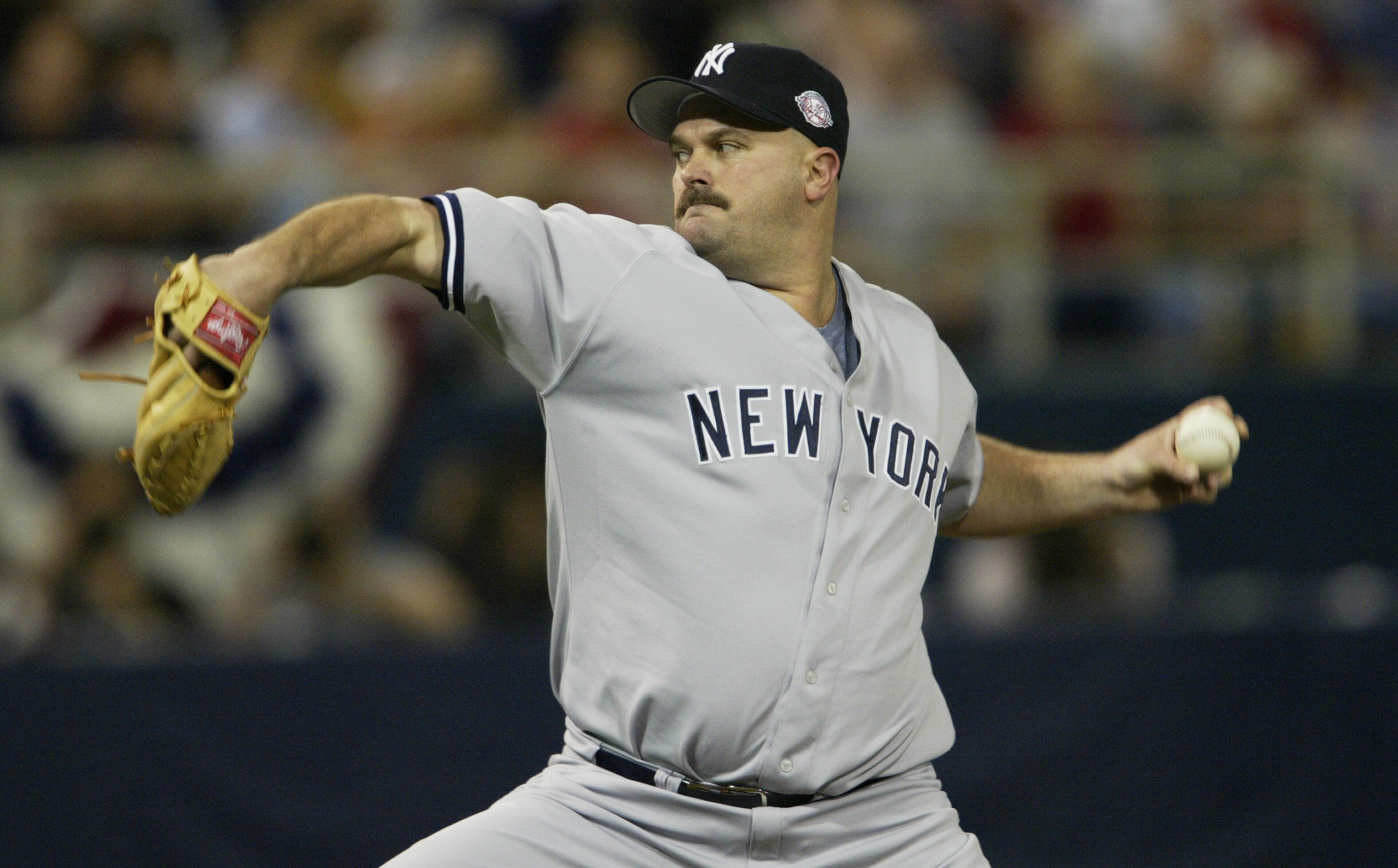 MINNEAPOLIS - OCTOBER 5: Starting pitcher David Wells #33 of the New York Yankees pitches during the American League Division Series against the Minnesota Twins on October 5, 2003 at the Hubert H. Humphrey Metrodome in Minneapolis, Minnesota. The Yankee MINNEAPOLIS - OCTOBER 5: Starting pitcher David Wells #33 of the New York Yankees pitches during the American League Division Series against the Minnesota Twins on October 5, 2003 at the Hubert H. Humphrey Metrodome in Minneapolis, Minnesota. The Yankee