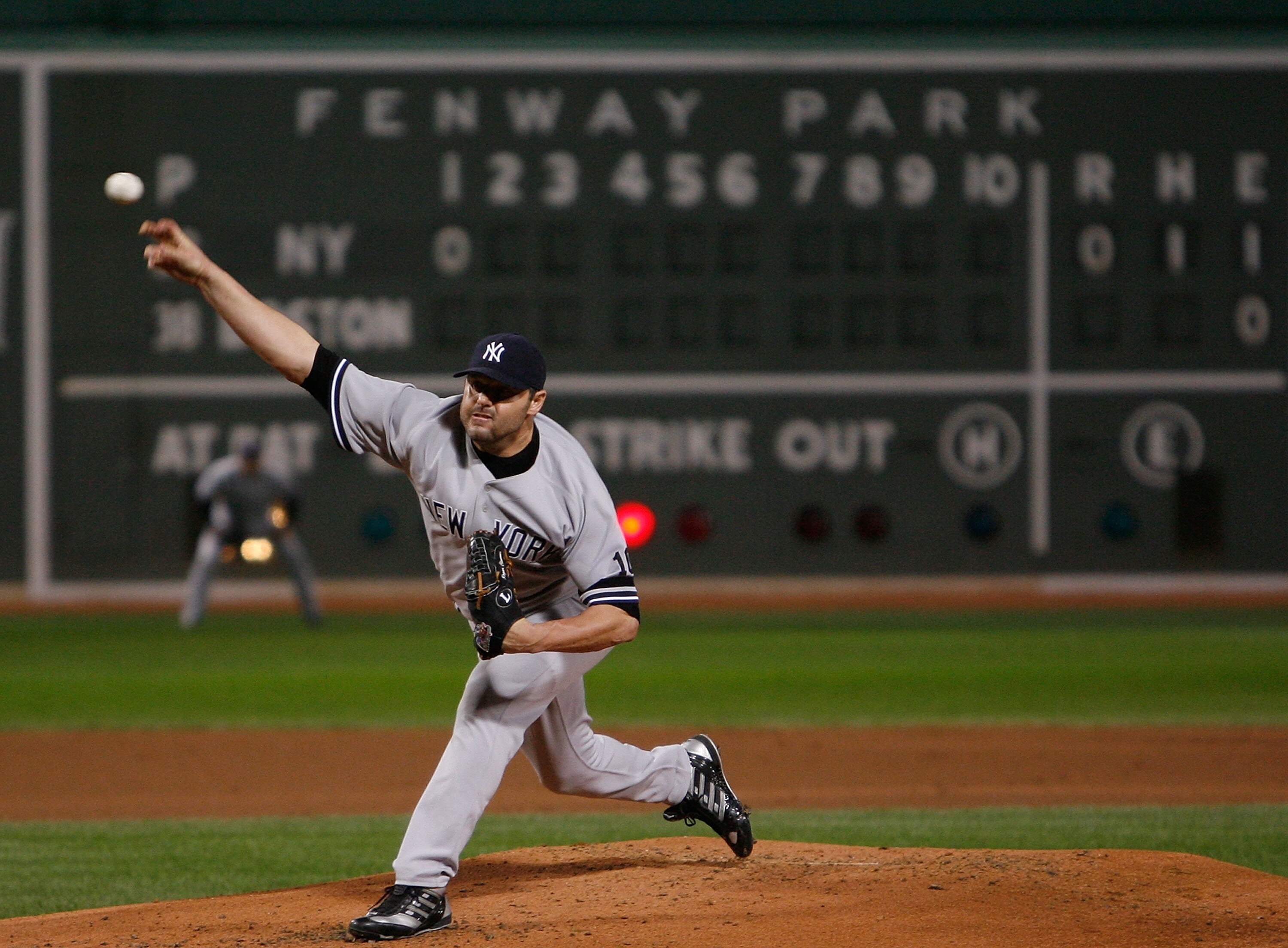 BOSTON - SEPTEMBER 16:  Roger Clemens #22 of the New York Yankees throw during a game against the Boston Red Sox  at Fenway Park on September 16, 2007 in Boston, Massachusetts.  (Photo by Jim Rogash/Getty Images)