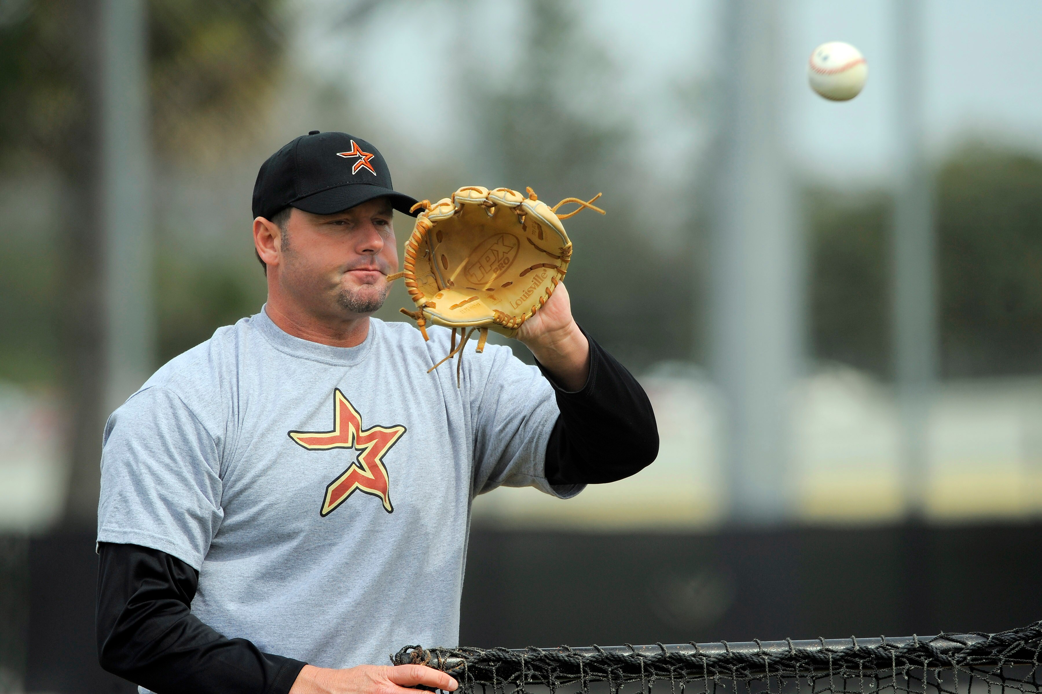 KISSIMMEE, FL - FEBRUARY 27: Roger Clemens catches during minor league batting practice at Houston Spring Training at Osceola County Stadium on February 27, 2008 in Kissimmee, Florida. The U.S. House Oversight and Government Reform Committee has asked the