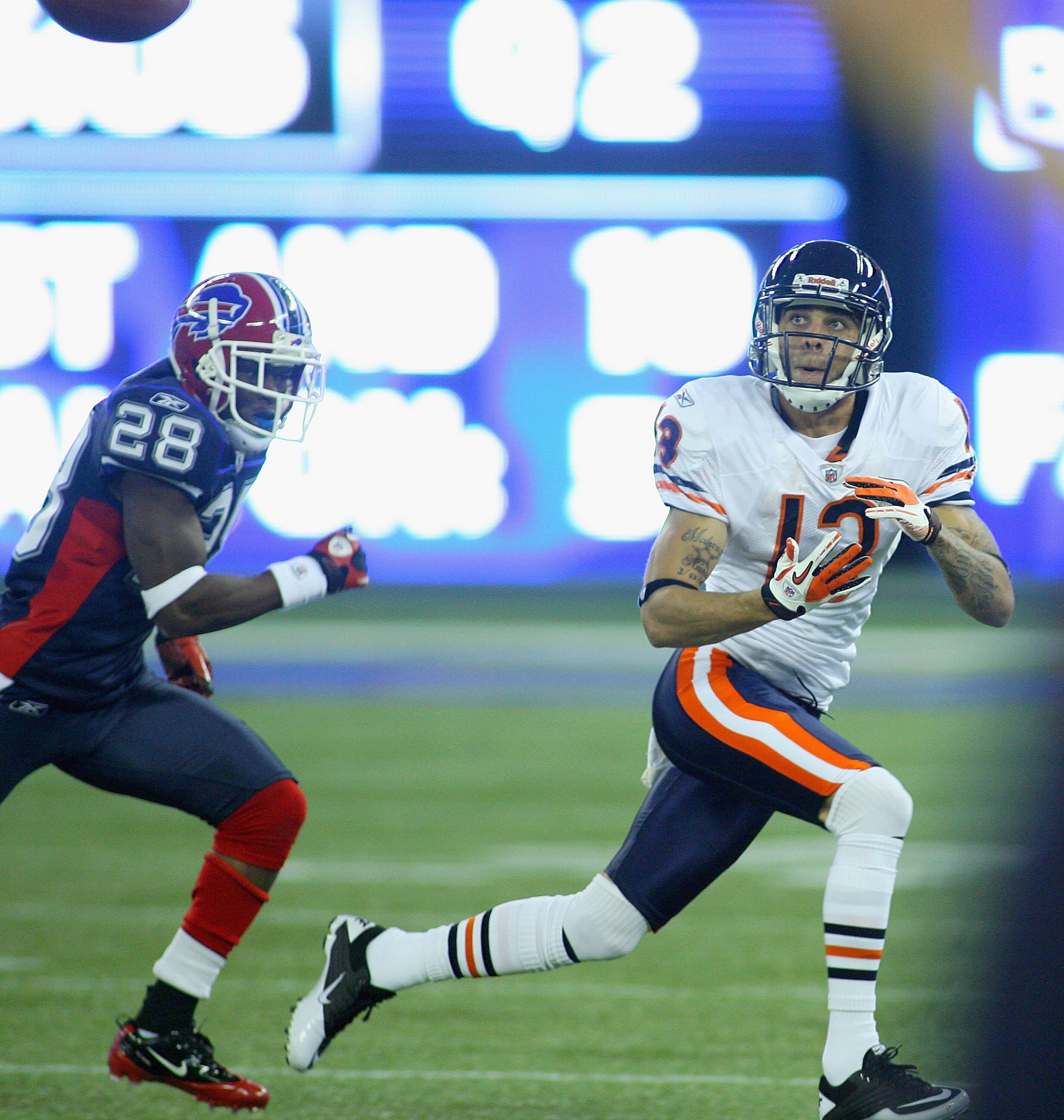 TORONTO, ON - NOVEMBER 07: Johnny Knox #13 of the Chicago Bears follows the ball prior to a catch as Leodis McKelvin #28 of the Buffalo Bills defends  at Rogers Centre on November 7, 2010 in Toronto, Canada.  (Photo by Rick Stewart/Getty Images)