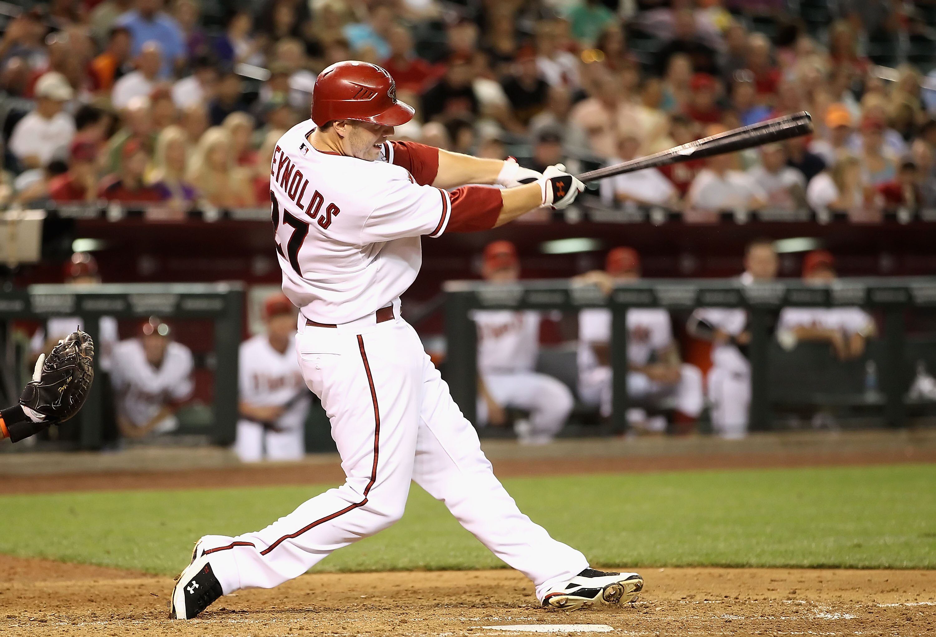 PHOENIX - MAY 20:  Mark Reynolds #27 of the Arizona Diamondbacks hits a 2 run home run against the San Francisco Giants during the fifth inning of the Major League Baseball game at Chase Field on May 20, 2010 in Phoenix, Arizona.  (Photo by Christian Pete