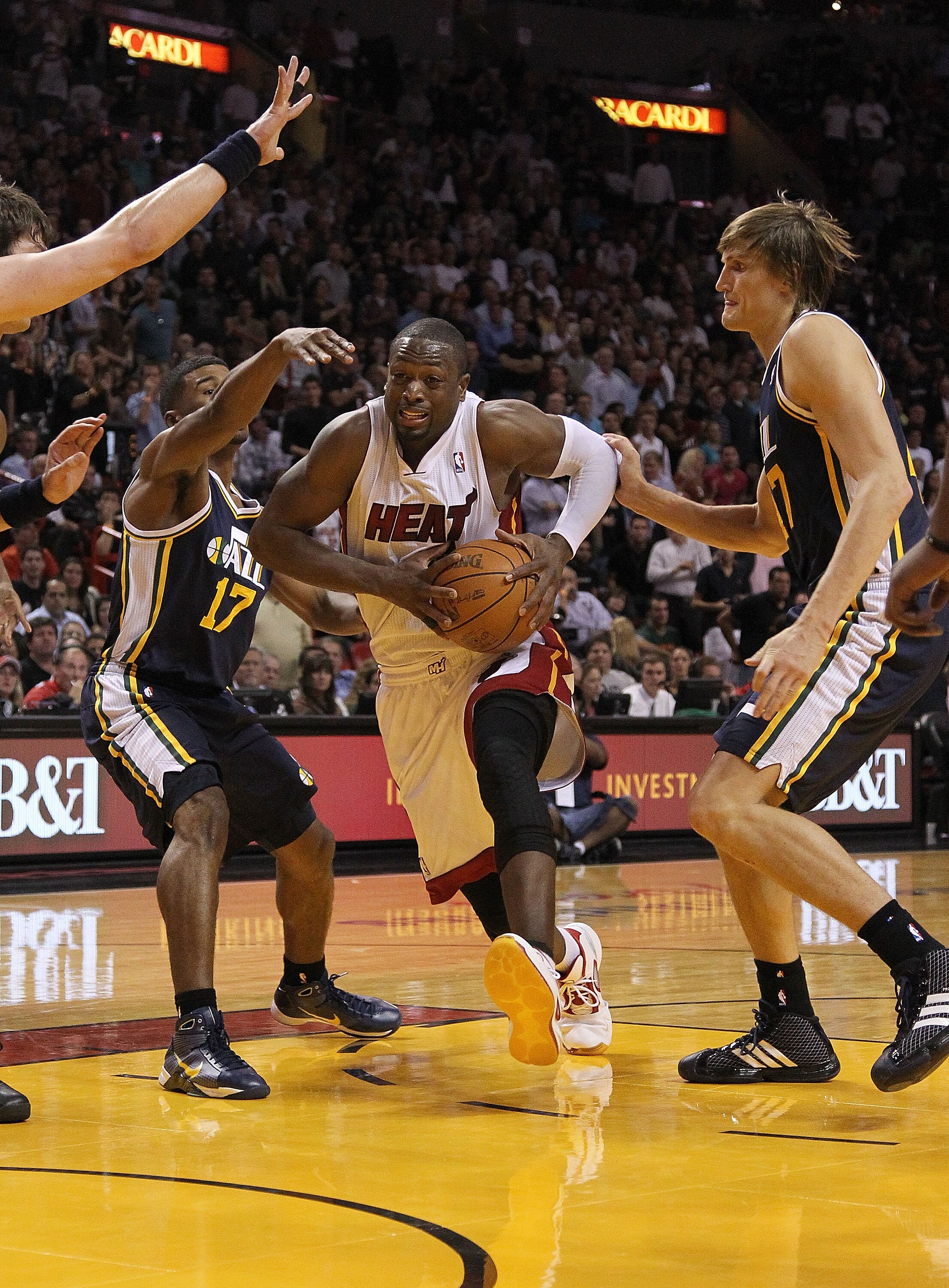 MIAMI - NOVEMBER 09:  Dwayne Wade #3  of the Miami Heat drives to the hoop during a game against the Utah Jazz at American Airlines Arena on November 9, 2010 in Miami, Florida. NOTE TO USER: User expressly acknowledges and agrees that, by downloading and/