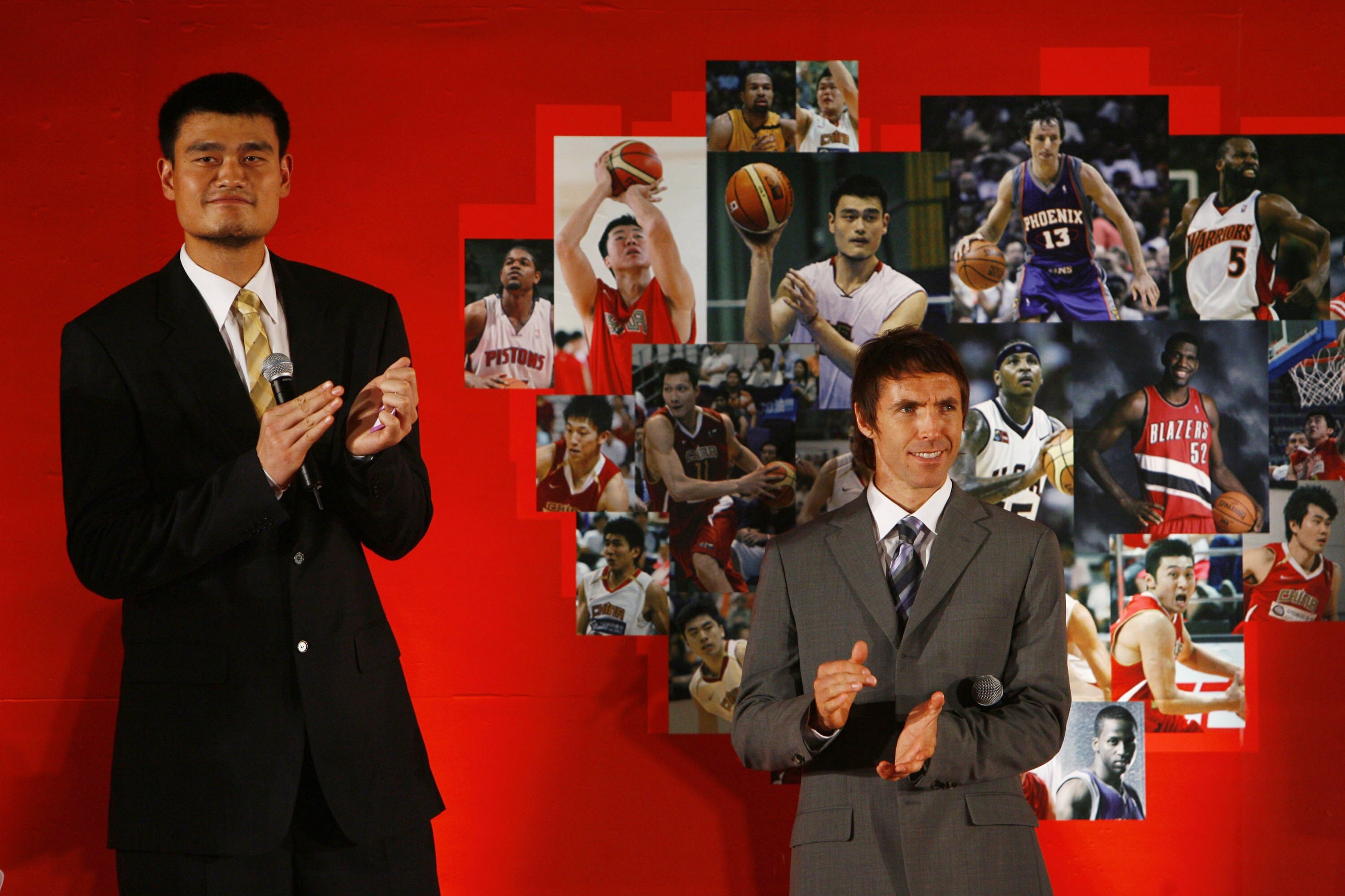 BEIJING, CHINA - SEPTEMBER 13: (CHINA OUT) Chinese basketball star Yao Ming (L) and NBA star Steve Nash attend their charity auction banquet at Diao Yu Tai State Guest House on September 13, 2007 in Beijing, China.  The charity banquet is part of the Yao-