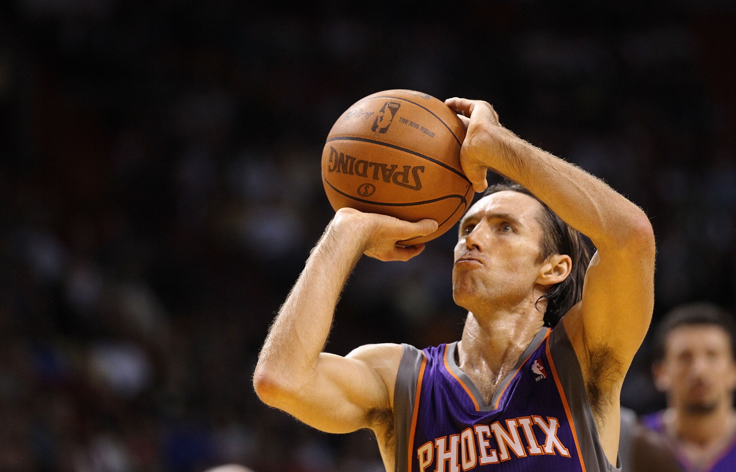 MIAMI - NOVEMBER 17:  Steve Nash #13  of the Phoenix Suns shoots a freethrow during a game against the  Miami Heat at American Airlines Arena on November 17, 2010 in Miami, Florida. NOTE TO USER: User expressly acknowledges and agrees that, by downloading