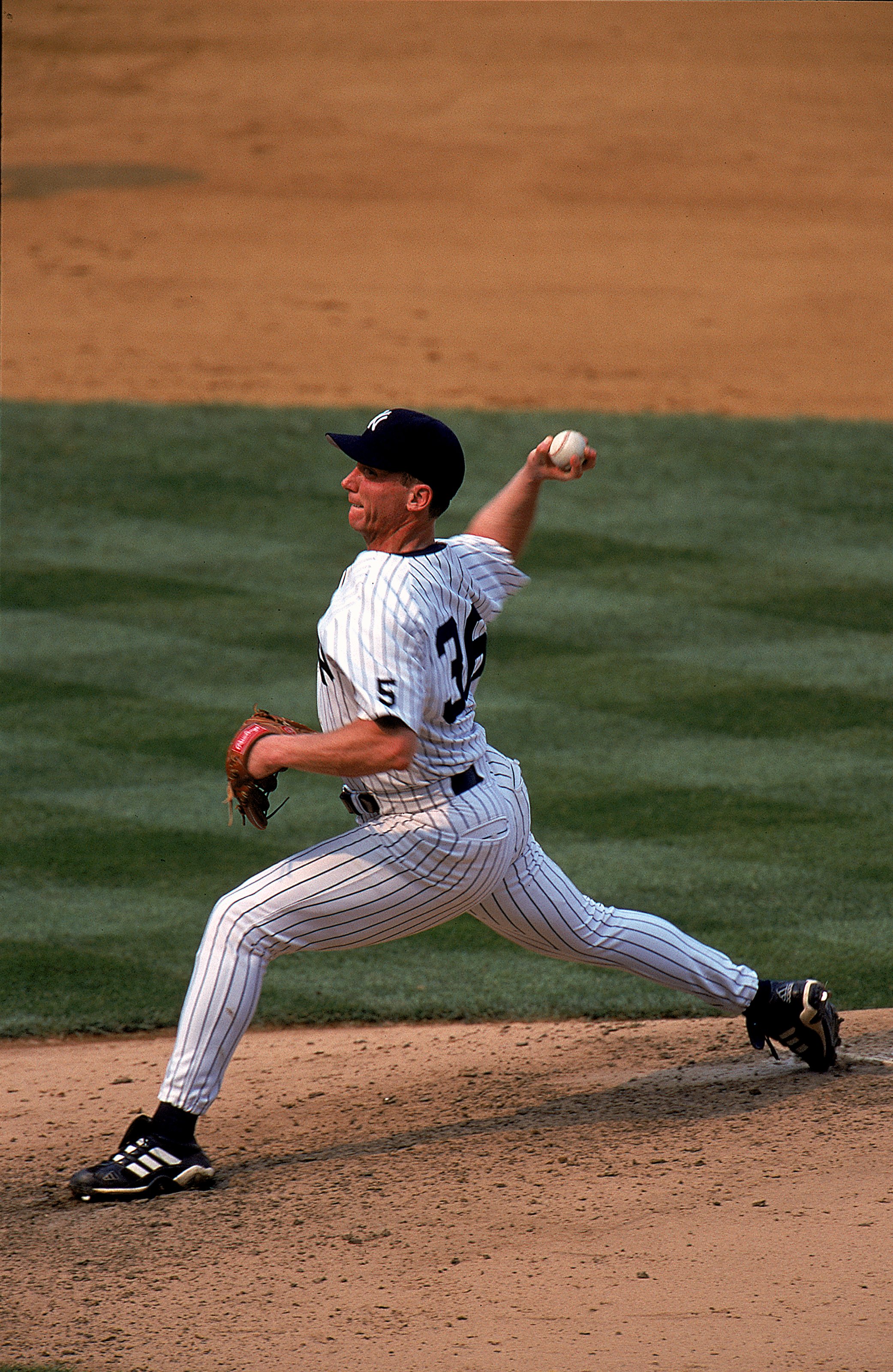 18 Jul 1999: Pitcher David Cone #36 of the New York Yankees throws the ball during the game against the Montreal Expos at Yankee Stadium in Bronx, New York. The Yankees defeated the Expos 6-0.