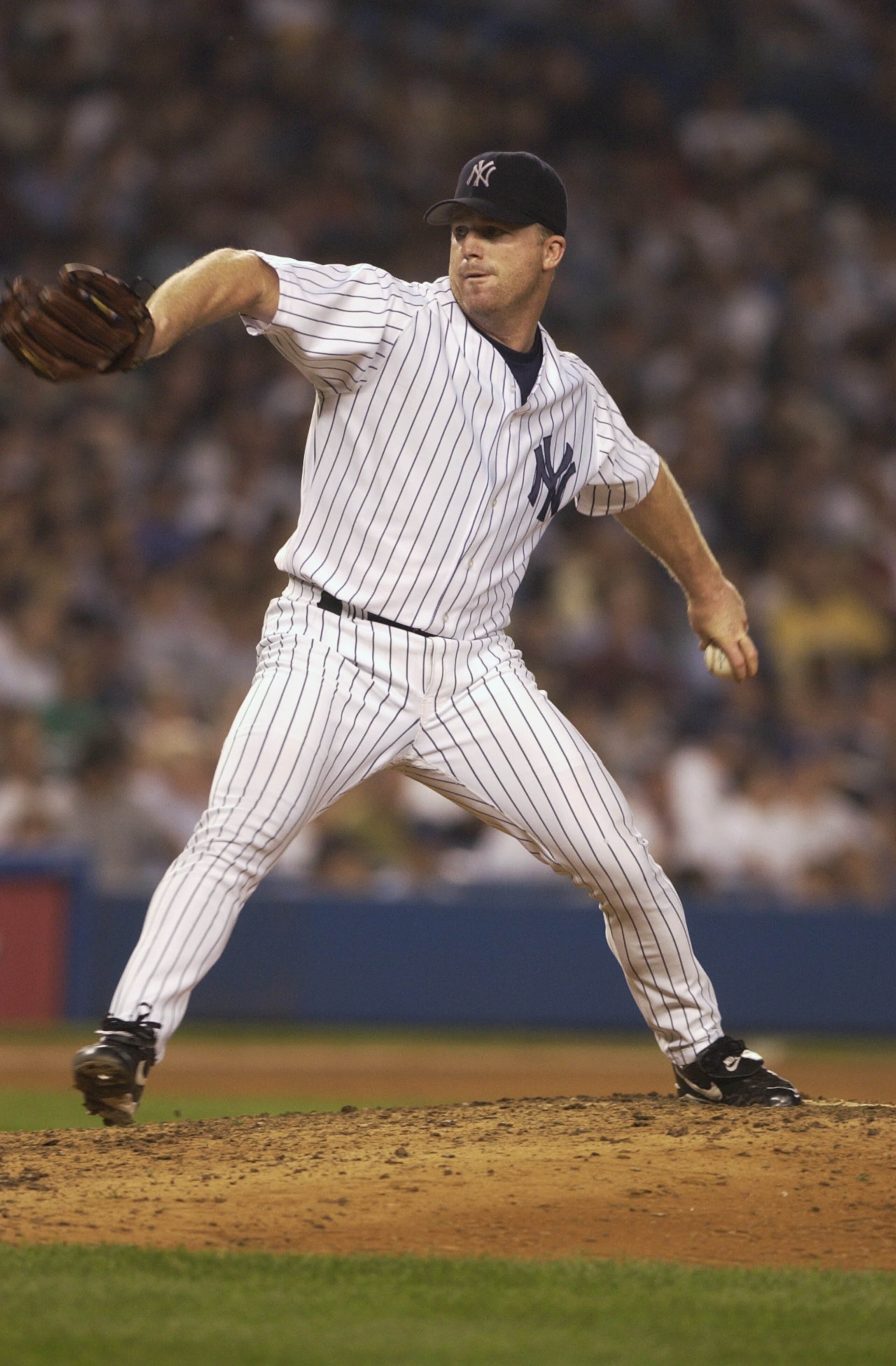 BRONX, NY - OCTOBER 2:  Mike Stanton #29 of the New York Yankees delivers the pitch during game two of the American League Division Series against the Anaheim Angels at Yankee Stadium in the Bronx, New York on October 2, 2002.  The Angels defeated the Yan