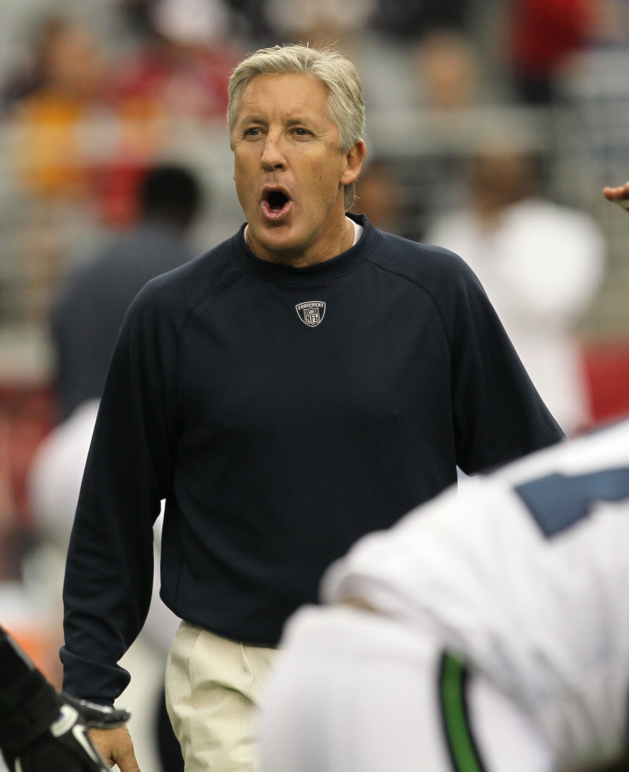 GLENDALE, AZ - NOVEMBER 14: Head coach Pete Carroll of the Seattle Seahawks shouts to players during warmups for the game with the Arizona Cardinals at University of Phoenix Stadium on November 14, 2010 in Glendale, Arizona. (Photo by Stephen Dunn/Getty I