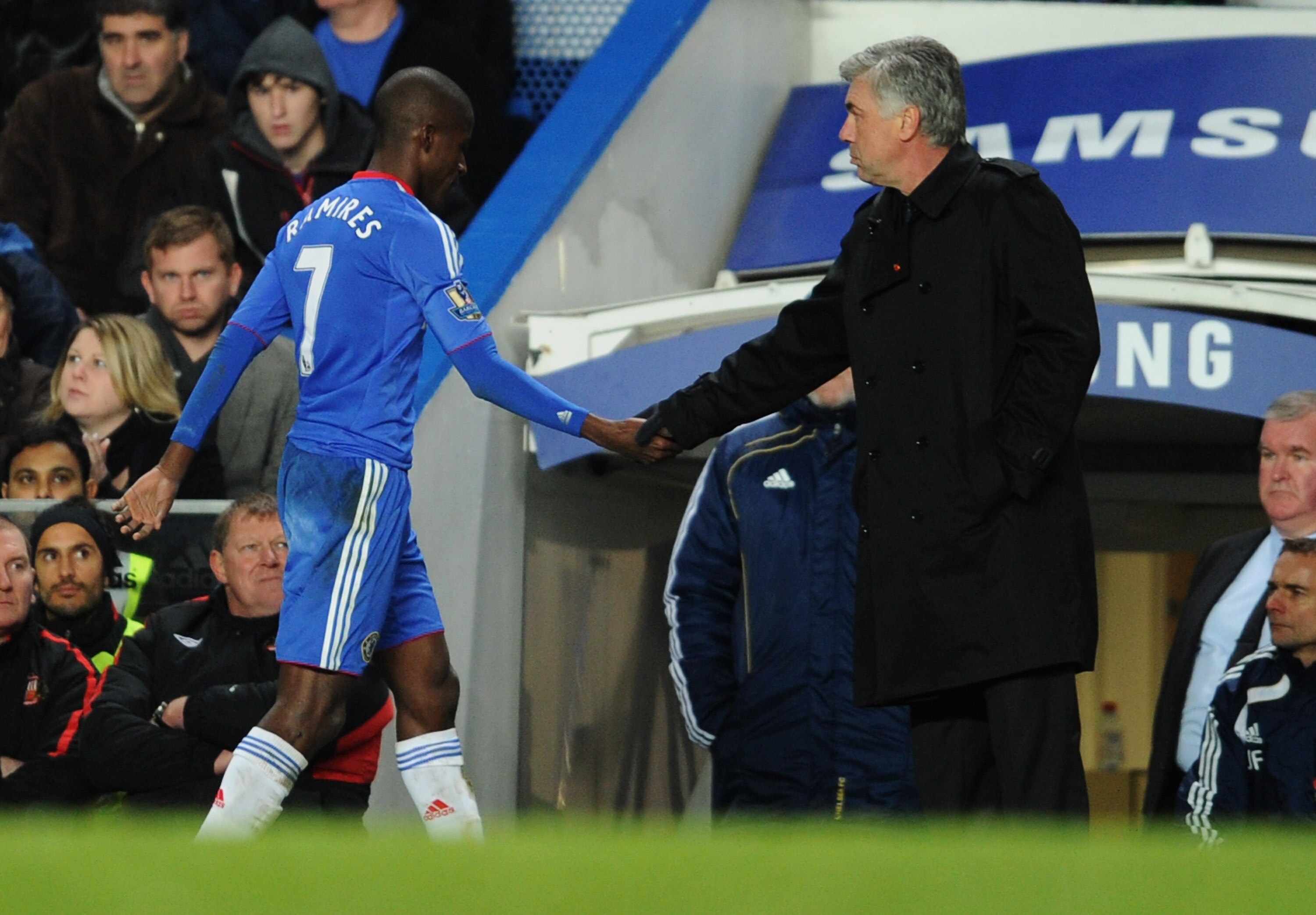 LONDON, ENGLAND - NOVEMBER 14:  Carlo Ancelotti manager of Chelsea shakes hands with Ramires as he is substituted during the Barclays Premier League match between Chelsea and Sunderland at Stamford Bridge on November 14, 2010 in London, England.  (Photo b