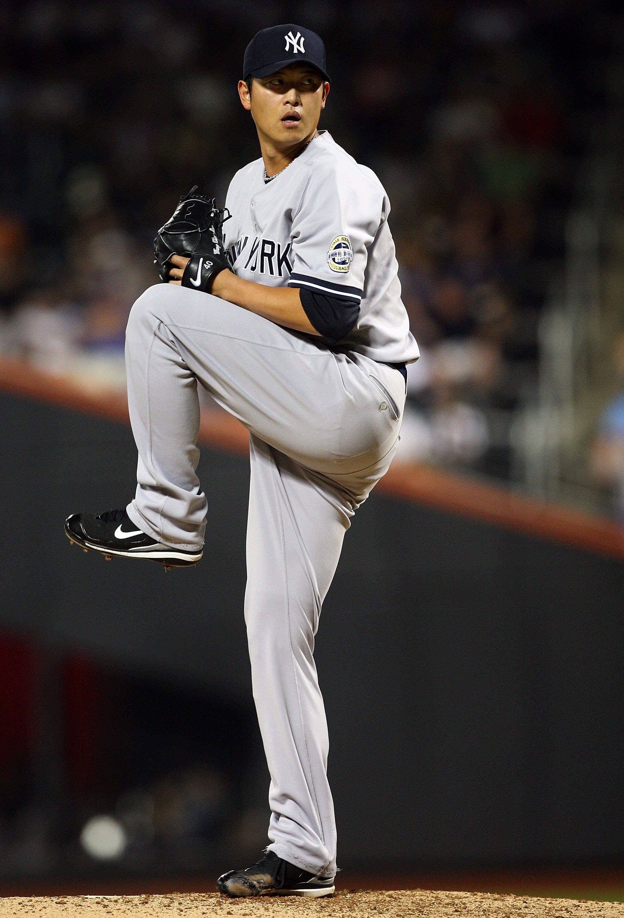 NEW YORK - JUNE 28:  Chien-Ming Wang #40 of the New York Yankees pitches against the New York Mets on June 28, 2009 at Citi Field in the Flushing neighborhood of the Queens borough of New York City.  (Photo by Jim McIsaac/Getty Images)