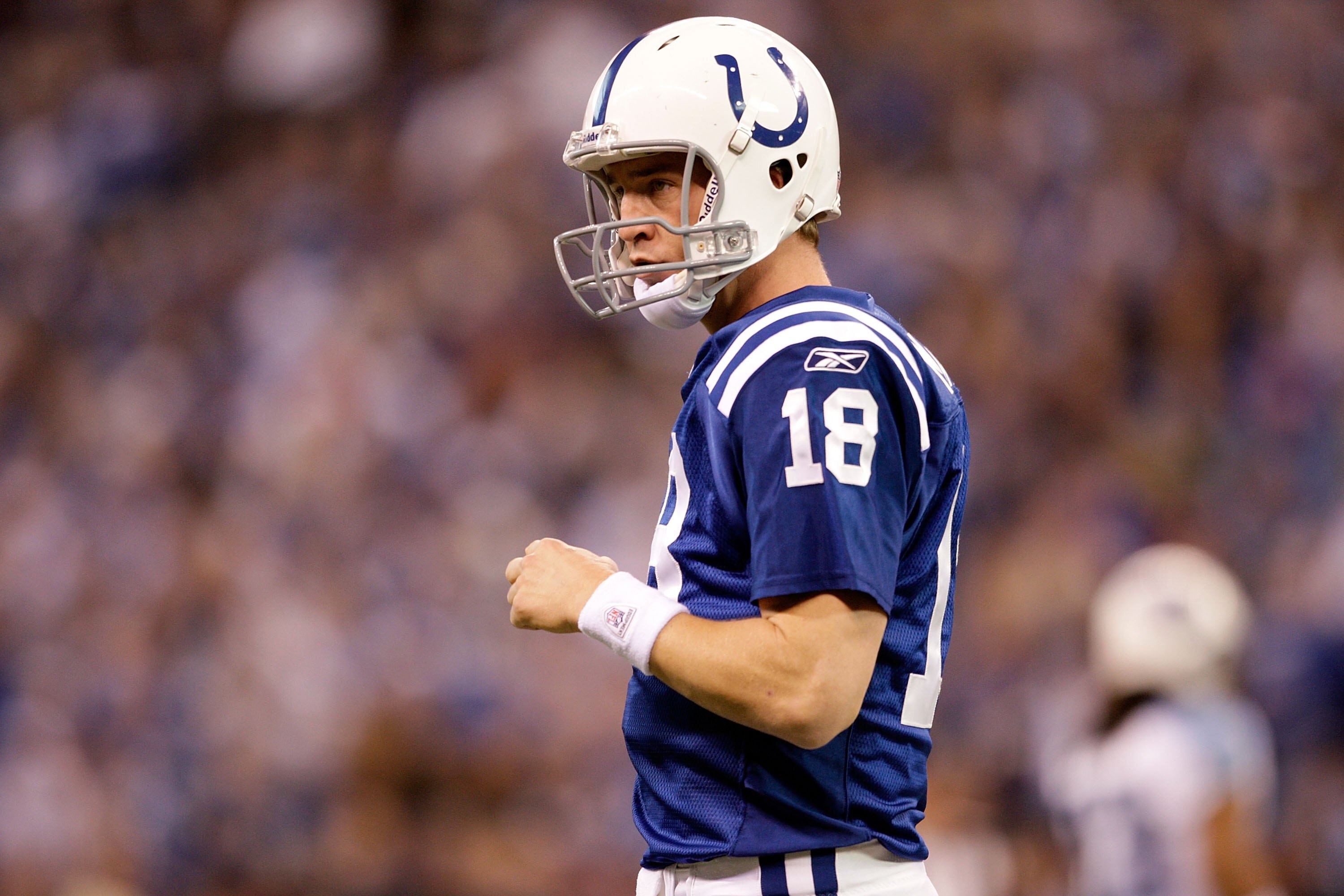 INDIANAPOLIS - DECEMBER 06:  Peyton Manning #18 of the Indianapolis Colts looks on during the NFL game against the Tennessee Titans at Lucas Oil Stadium on December 6, 2009 in Indianapolis, Indiana.  (Photo by Andy Lyons/Getty Images)
