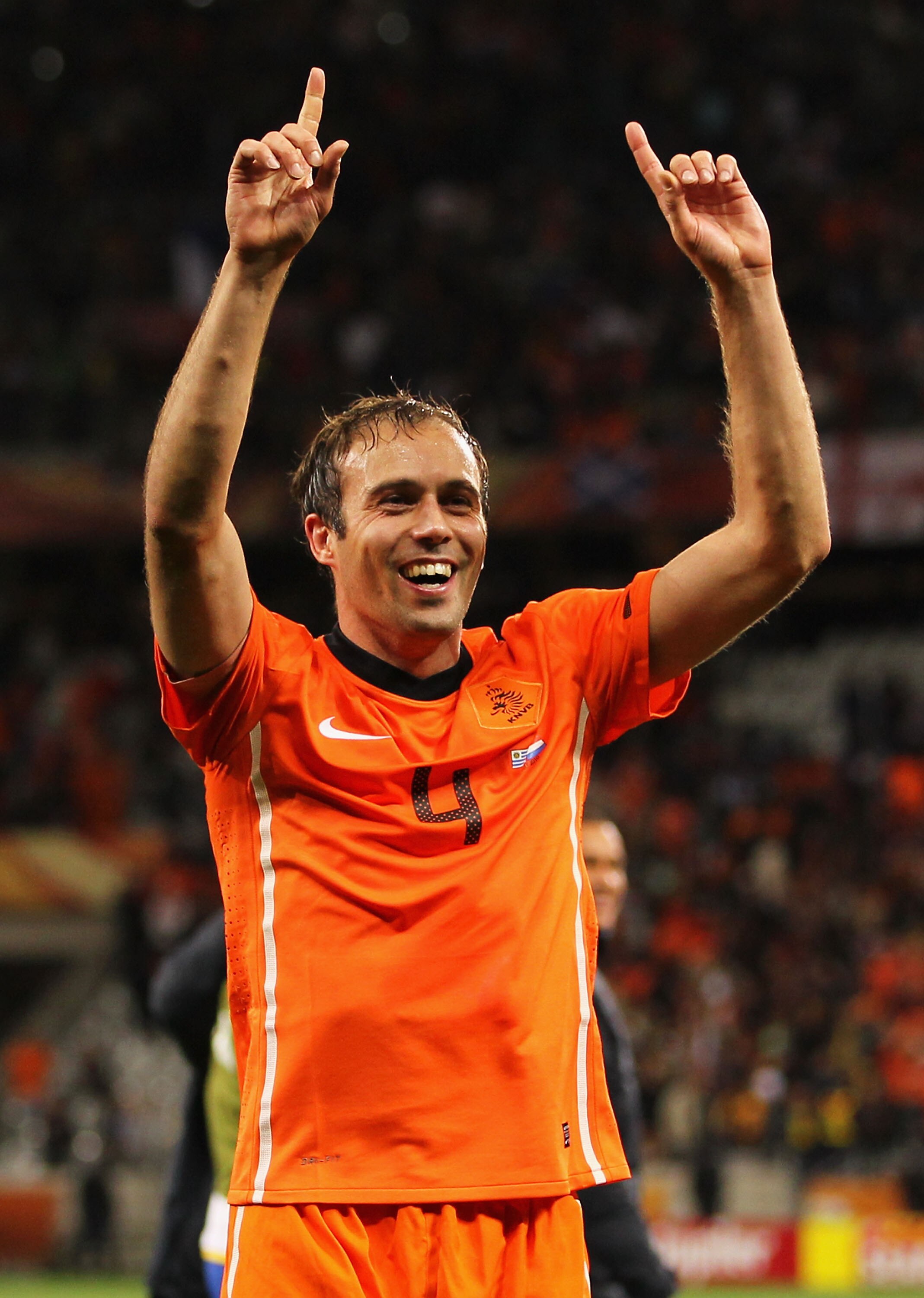 CAPE TOWN, SOUTH AFRICA - JULY 06:  Joris Mathijsen of the Netherlands celebrates victory and a place in the final during the 2010 FIFA World Cup South Africa Semi Final match between Uruguay and the Netherlands at Green Point Stadium on July 6, 2010 in C