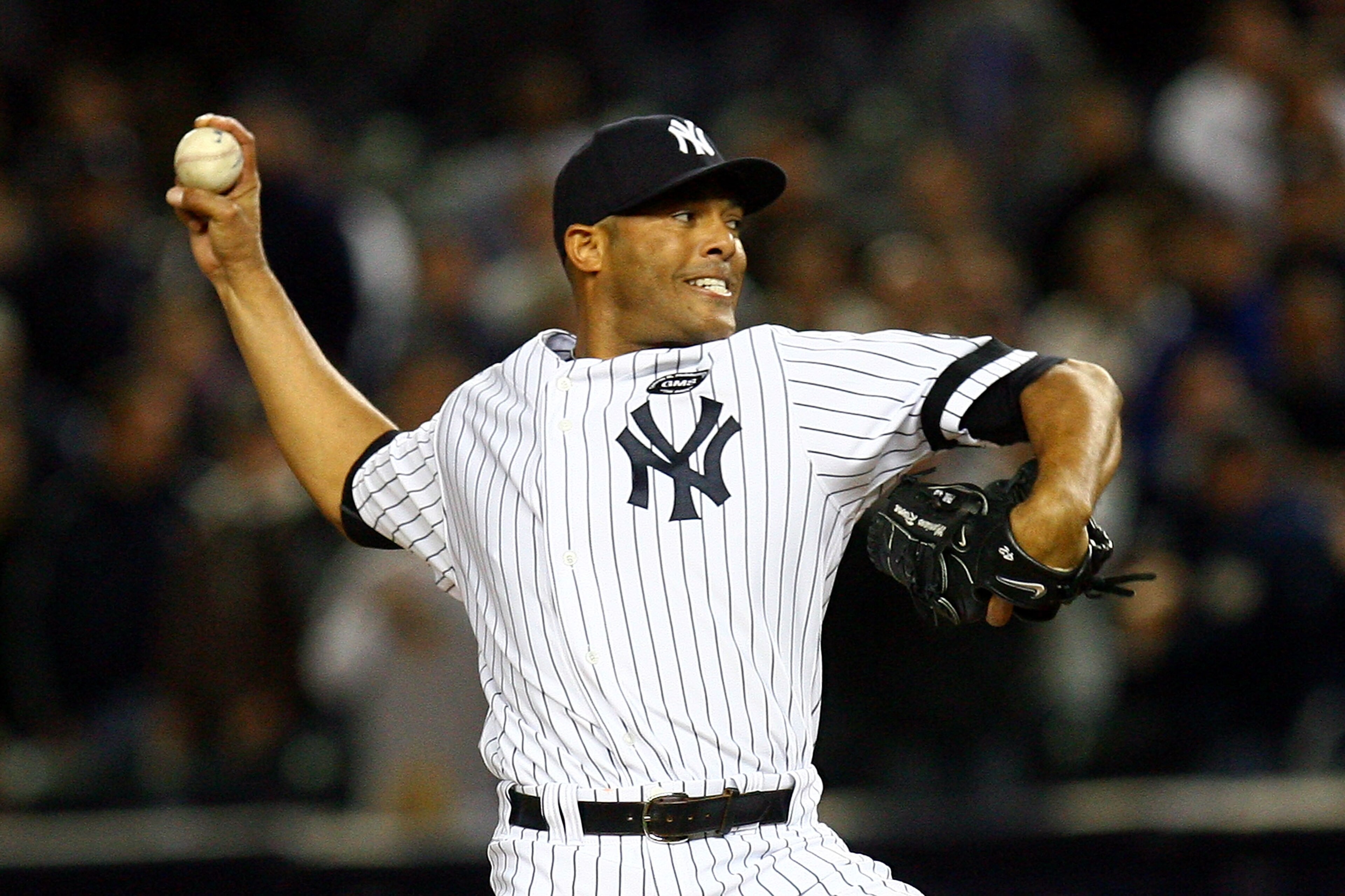 NEW YORK - OCTOBER 09: Mariano Rivera #42 of the New York Yankees throws a pitch against the Minnesota Twins during Game Three of the ALDS part of the 2010 MLB Playoffs at Yankee Stadium on October 9, 2010 in the Bronx borough of New York City. (Photo b NEW YORK - OCTOBER 09: Mariano Rivera #42 of the New York Yankees throws a pitch against the Minnesota Twins during Game Three of the ALDS part of the 2010 MLB Playoffs at Yankee Stadium on October 9, 2010 in the Bronx borough of New York City. (Photo b