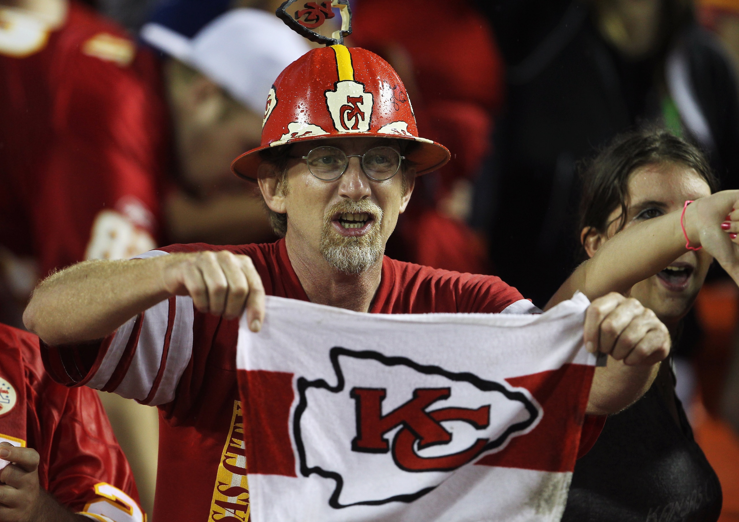 KANSAS CITY, MO - SEPTEMBER 13: A Kansas City Chiefs fan cheers during the game against the San Diego Chargers on September 13, 2010 at Arrowhead Stadium in Kansas City, Missouri. (Photo by Jamie Squire/Getty Images) KANSAS CITY, MO - SEPTEMBER 13: A Kansas City Chiefs fan cheers during the game against the San Diego Chargers on September 13, 2010 at Arrowhead Stadium in Kansas City, Missouri. (Photo by Jamie Squire/Getty Images)