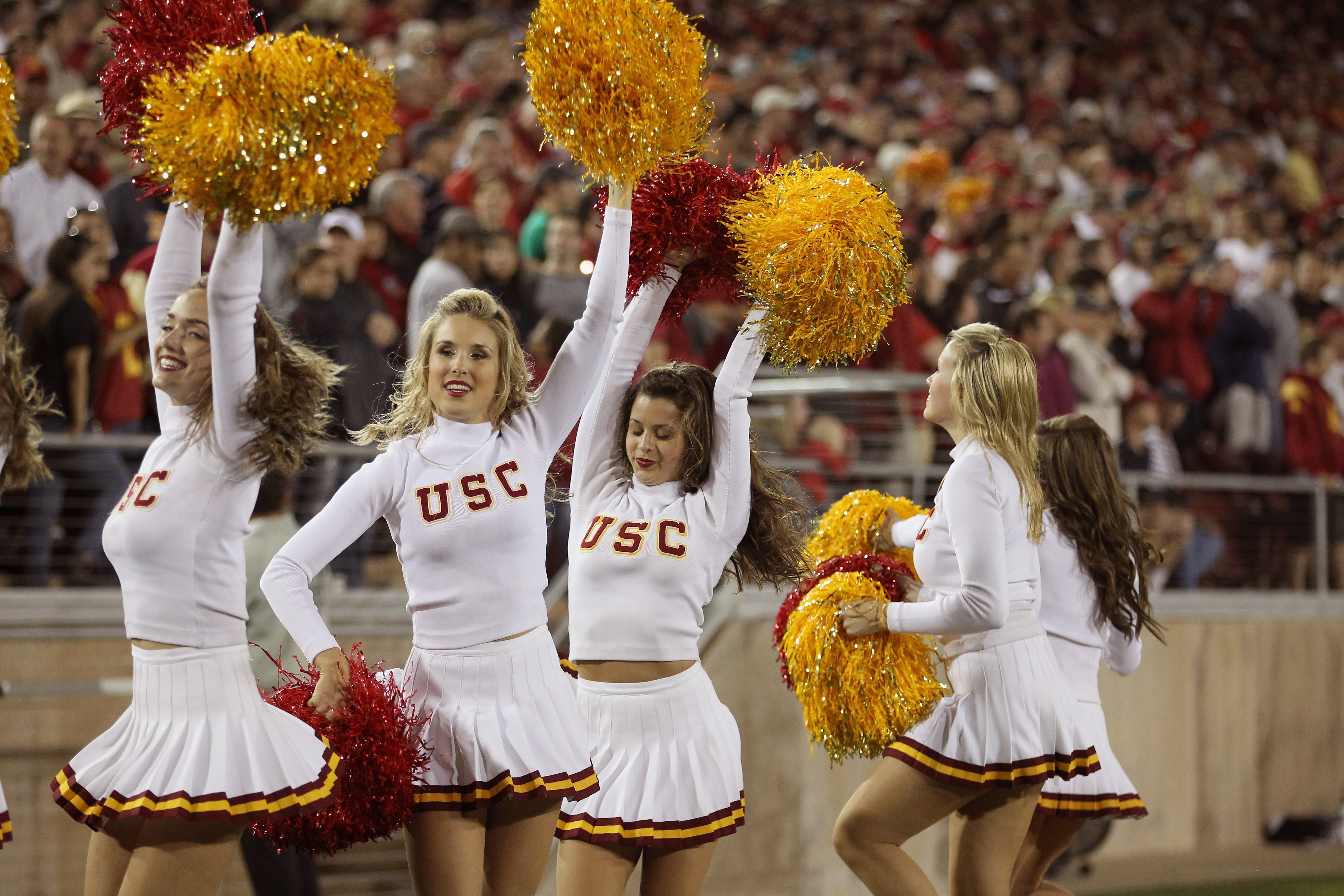 PALO ALTO, CA - OCTOBER 09:  The USC Trojan cheerleaders cheer for their team during their game against the Stanford Cardinal at Stanford Stadium on October 9, 2010 in Palo Alto, California.  (Photo by Ezra Shaw/Getty Images)